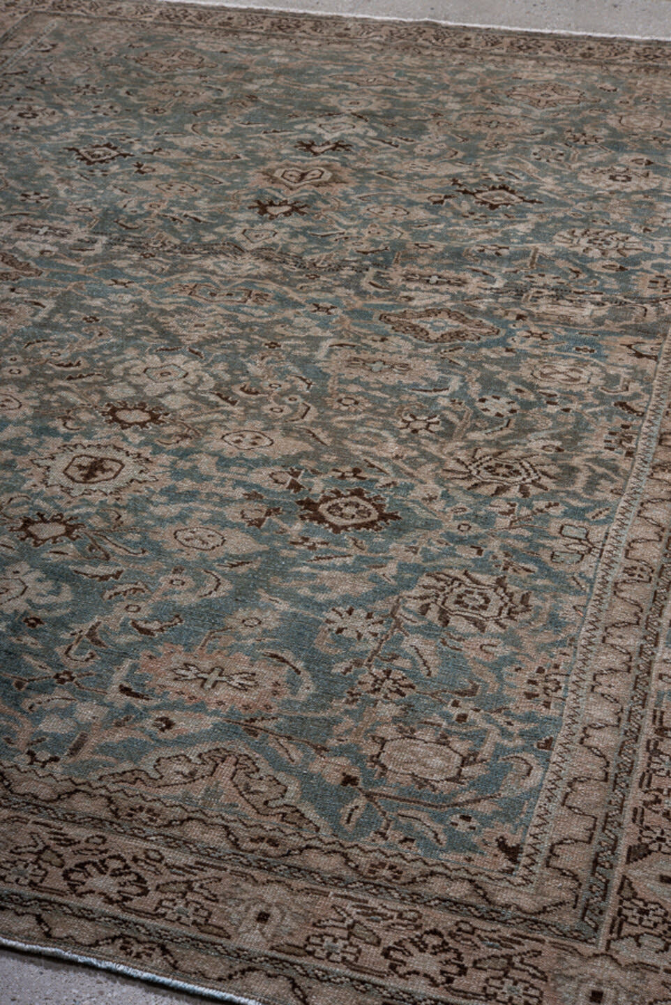 7' x 9' one-of-a-kind handmade antique Malayer rug. Color palette: blue, ivory, taupe, charcoal, gray, beige, black