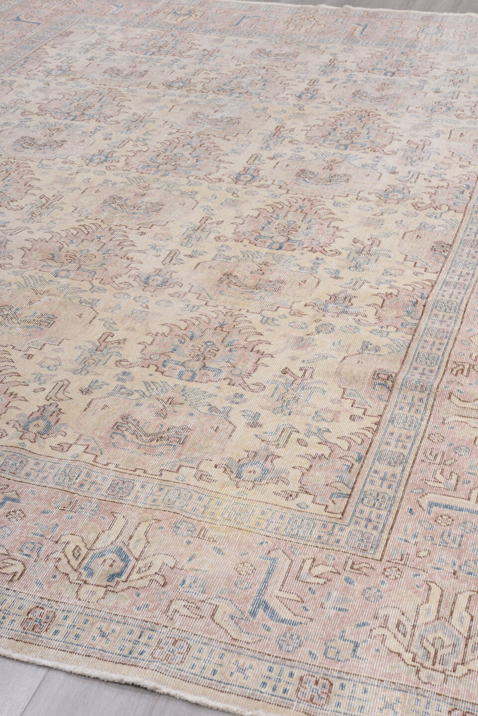 8' x 12' one-of-a-kind handmade vintage Sparta large size rug. Color palette: ivory, blush, pale blue, taupe, beige