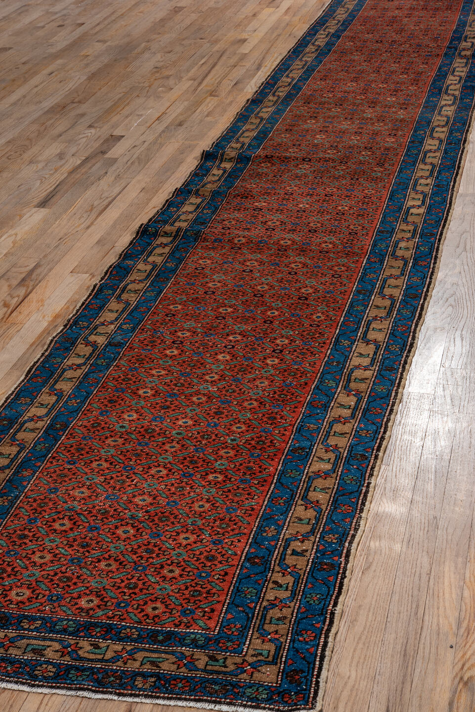 2' x 17' one-of-a-kind handmade vintage Heriz runner rug. Color palette: blue, brown, gray, off-white, pink, snow, white
