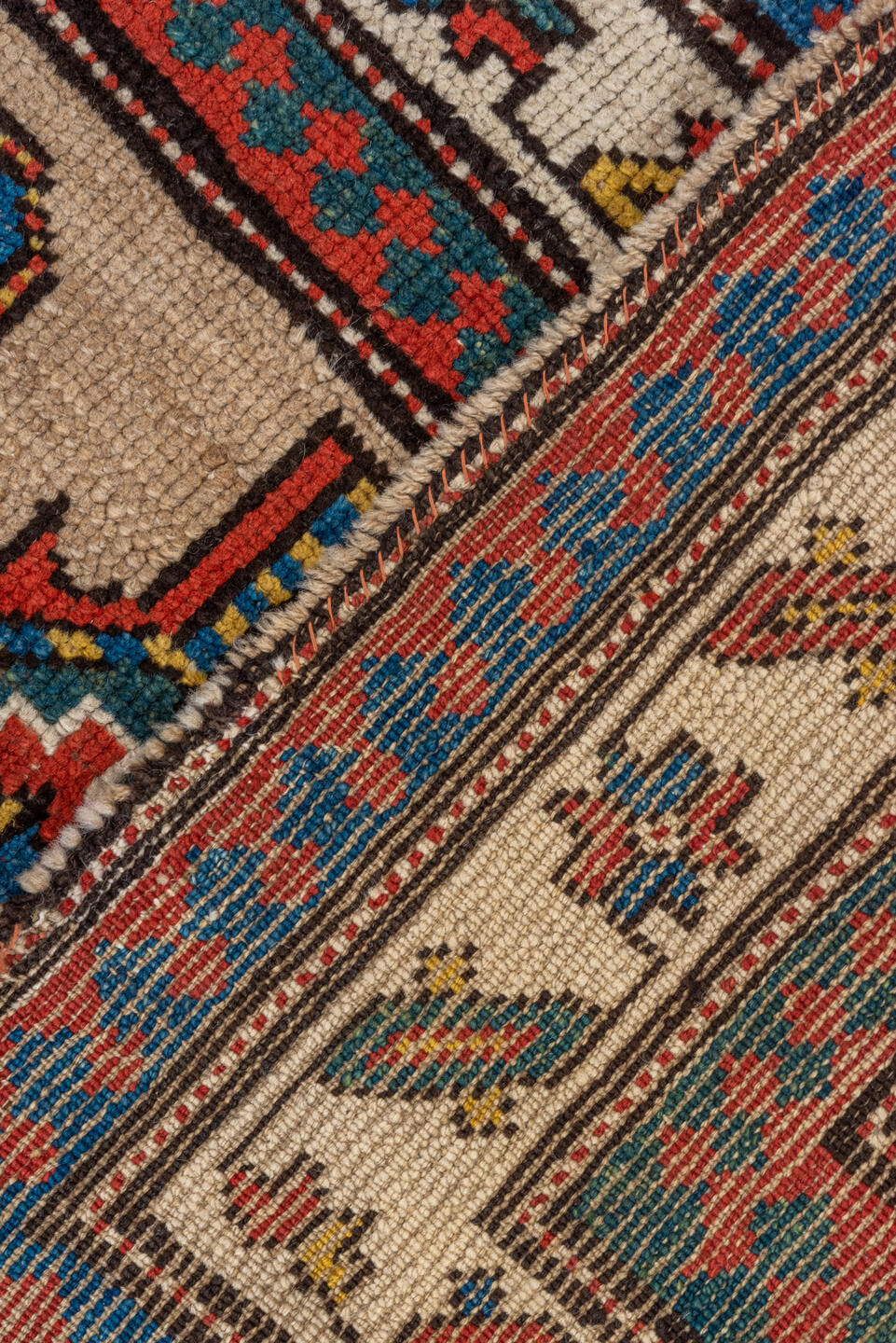 3' x 9' one-of-a-kind handmade antique Sarab runner rug. Color palette: ivory, rust, indigo, blue, brick, gold, charcoal
