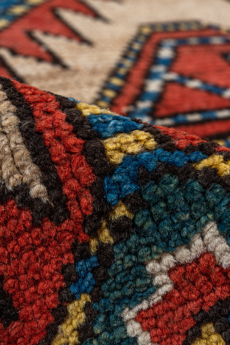 3' x 9' one-of-a-kind handmade antique Sarab runner rug. Color palette: ivory, rust, indigo, blue, brick, gold, charcoal