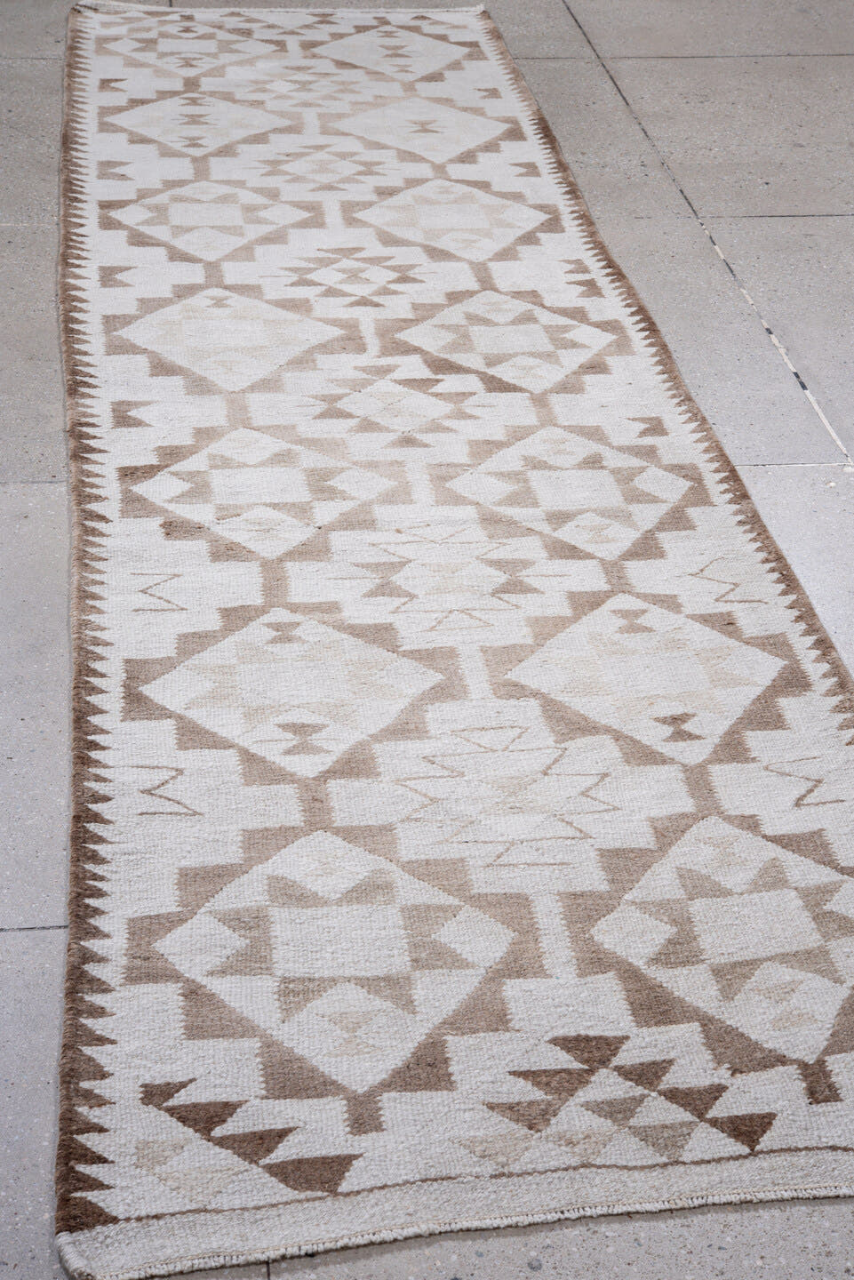3' x 11' one-of-a-kind handmade antique Kilim runner rug. Color palette: ivory, taupe, camel, beige, gray