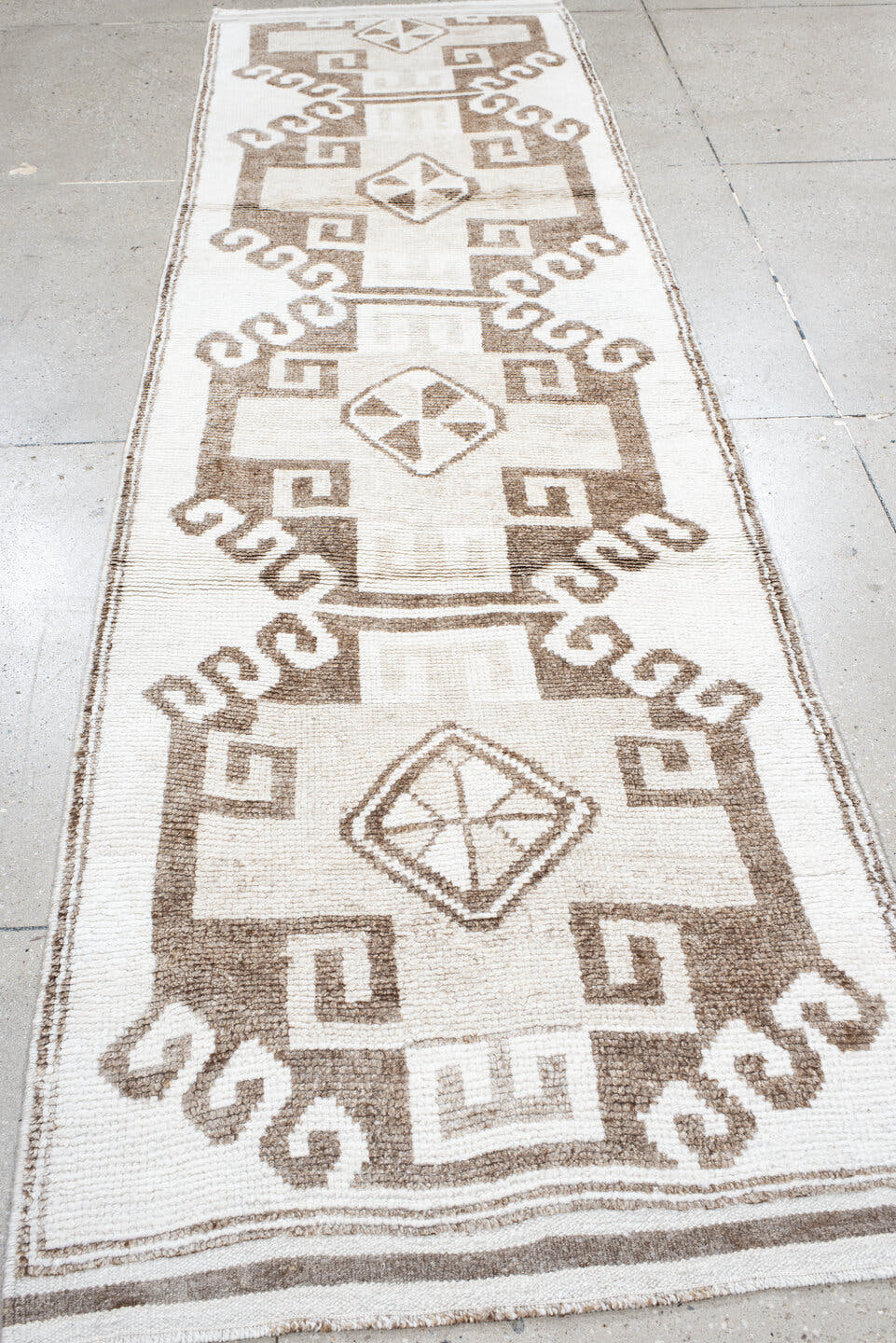 3' x 11' one-of-a-kind handmade vintage Kars runner rug. Color palette: ivory, taupe, beige, camel, gray