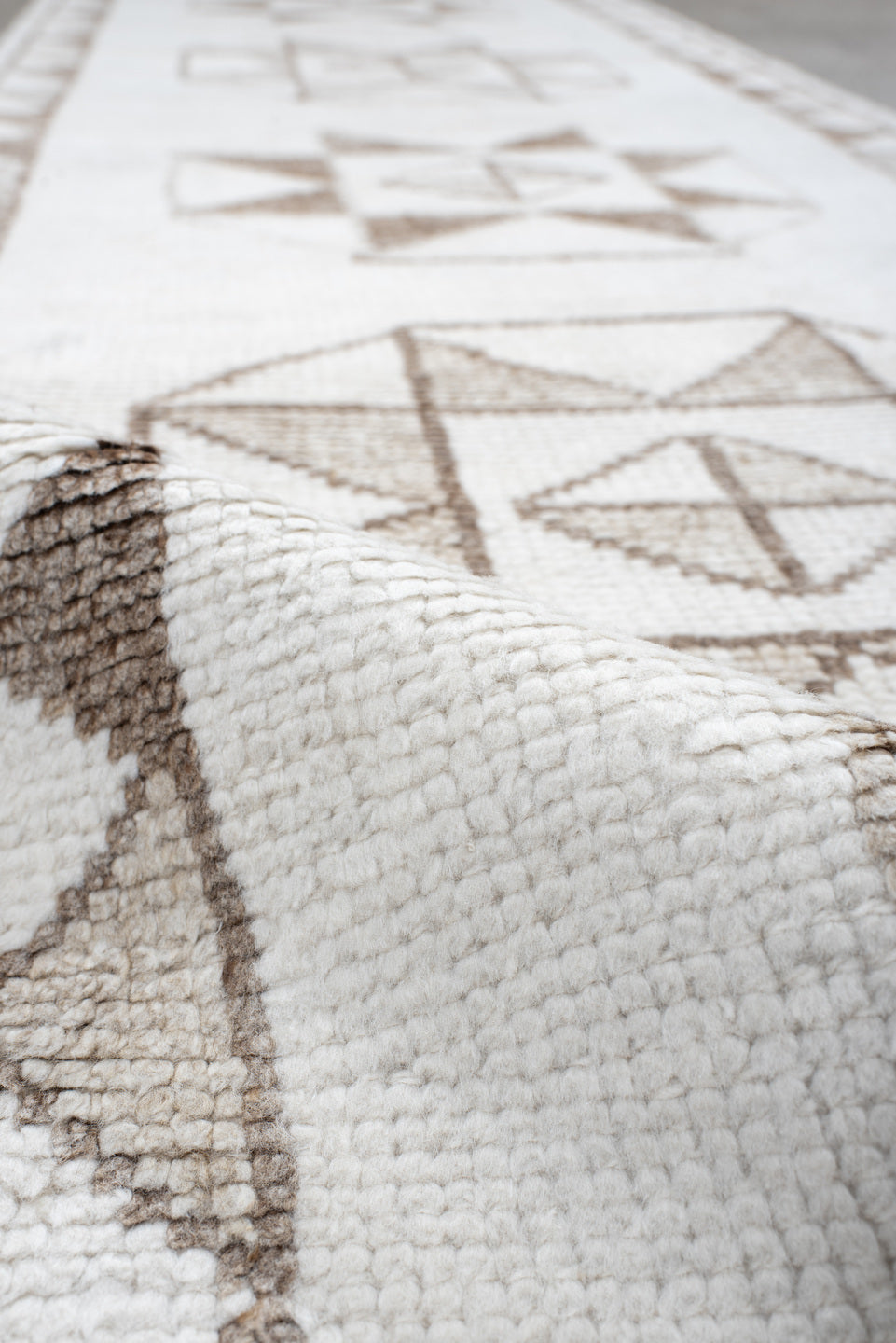 3' x 10' one-of-a-kind handmade vintage Kars runner rug. Color palette: brown, dark gray, gray, light gray, off-white, pink