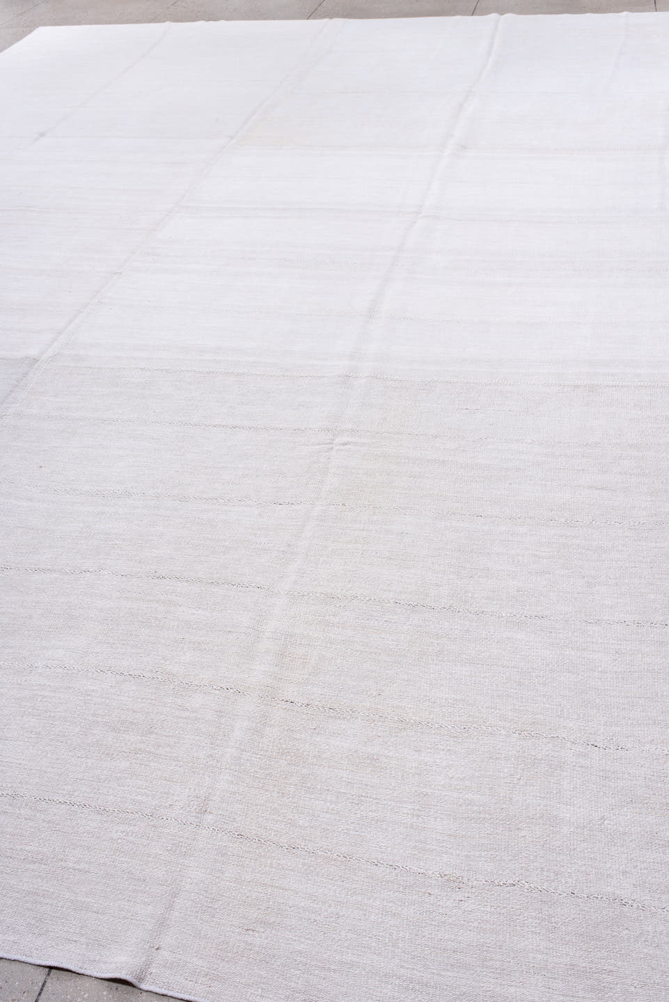 11' x 17' one-of-a-kind handmade antique Flatweave oversize rug. Color palette: ivory, cream, taupe, beige, gray