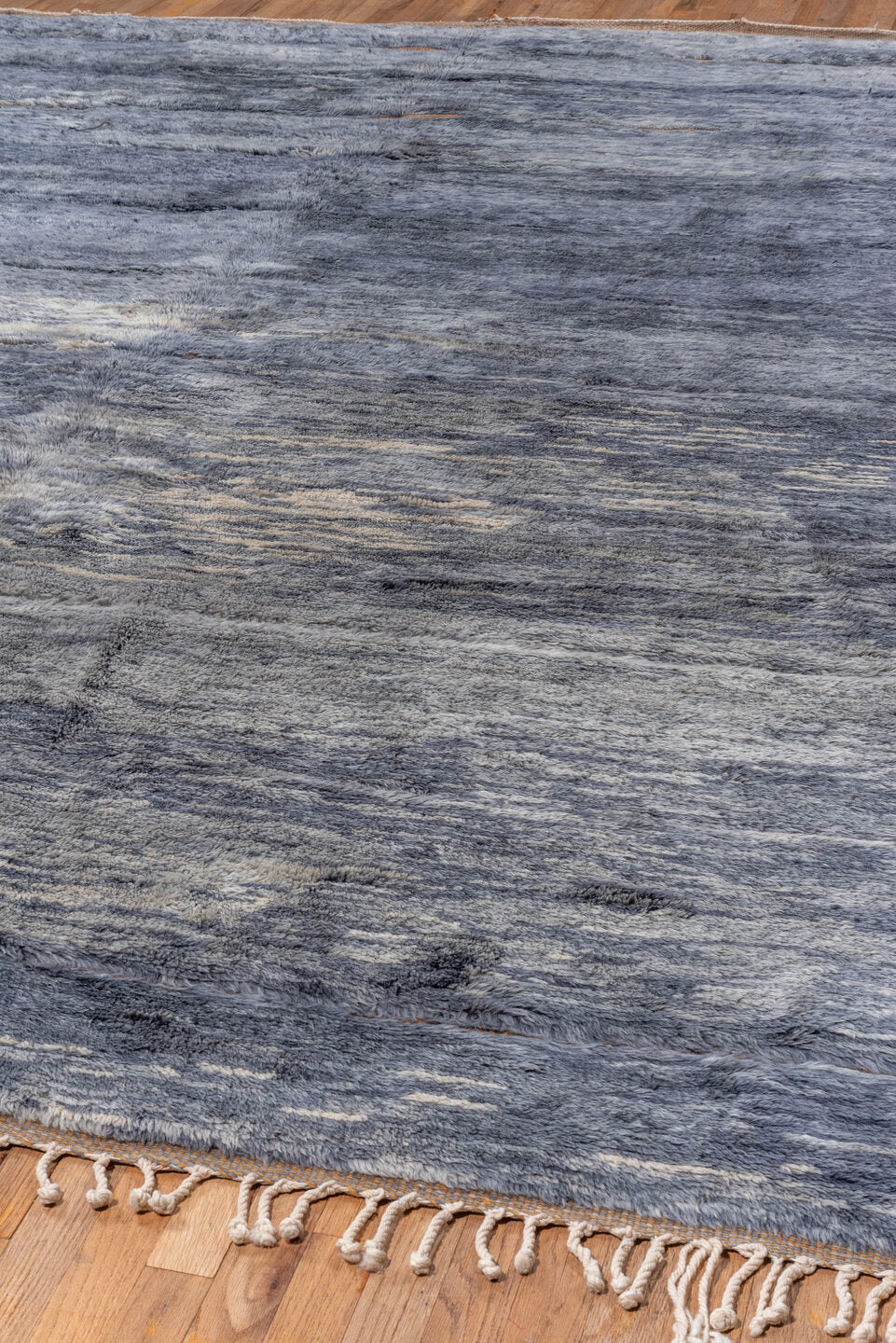 10' x 12' one-of-a-kind handmade vintage Moroccan large size rug. Color palette: black, blue, brown, gray, light blue