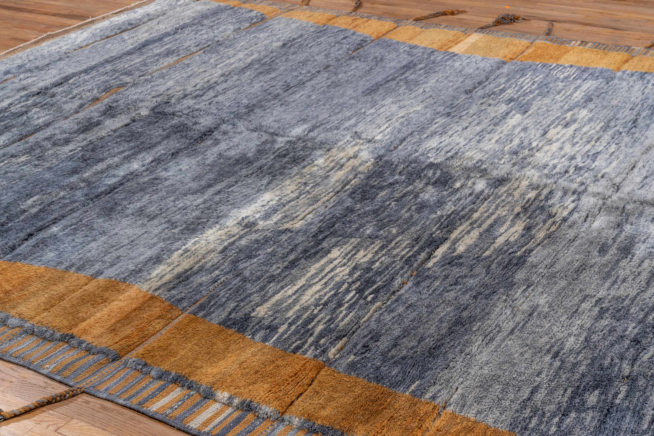 10' x 12' one-of-a-kind handmade vintage Moroccan large size rug. Color palette: black, blue, brown, gray, light blue