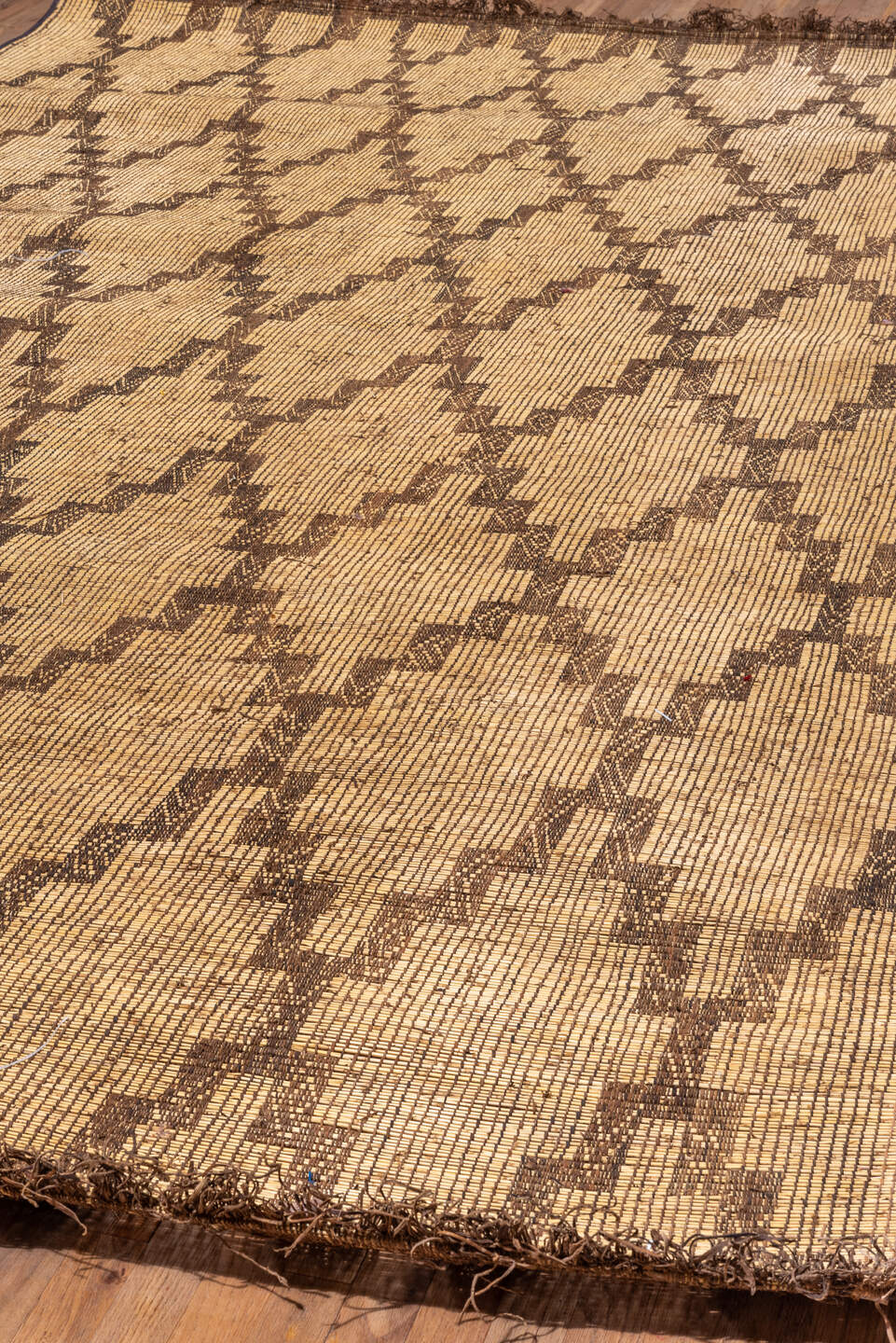8' x 13' one-of-a-kind handmade vintage Tuareg large size rug. Color palette: camel, brown, tan, beige