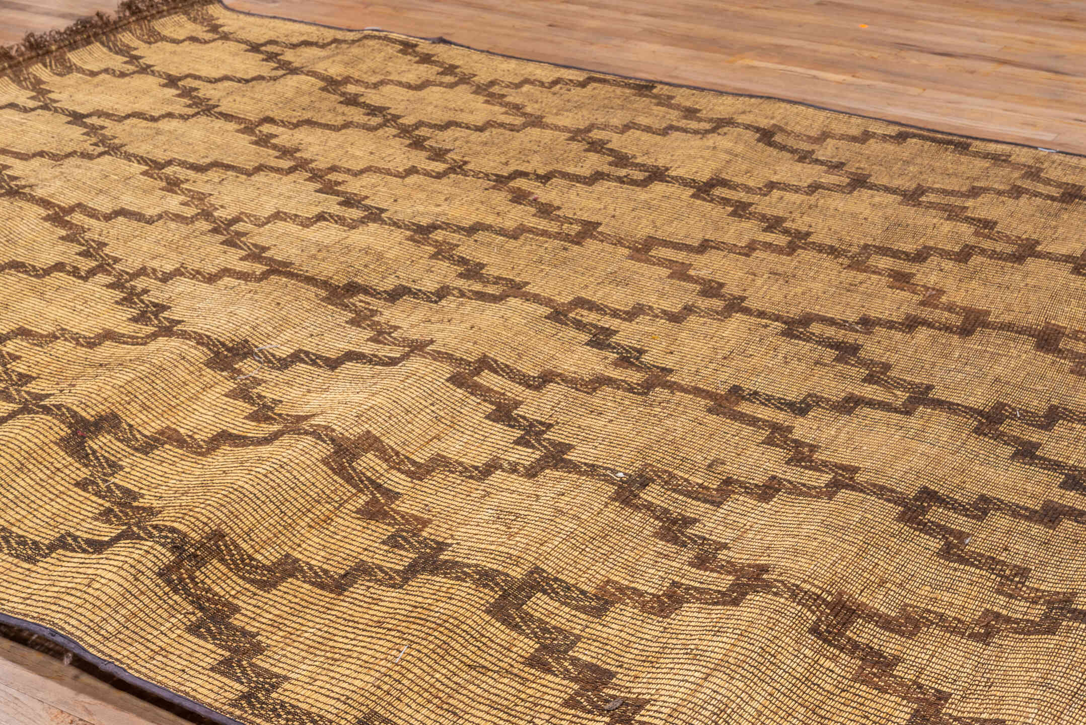 8' x 13' one-of-a-kind handmade vintage Tuareg large size rug. Color palette: camel, brown, tan, beige