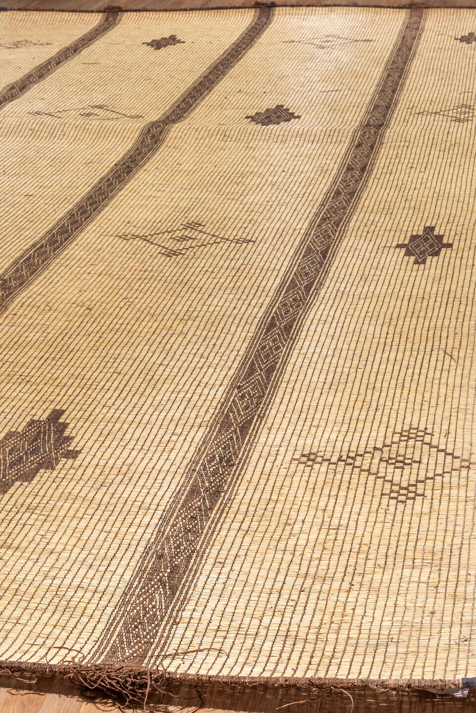8' x 16' one-of-a-kind handmade vintage Tuareg rug. Color palette: camel, brown, tan, taupe, ivory, beige, gray