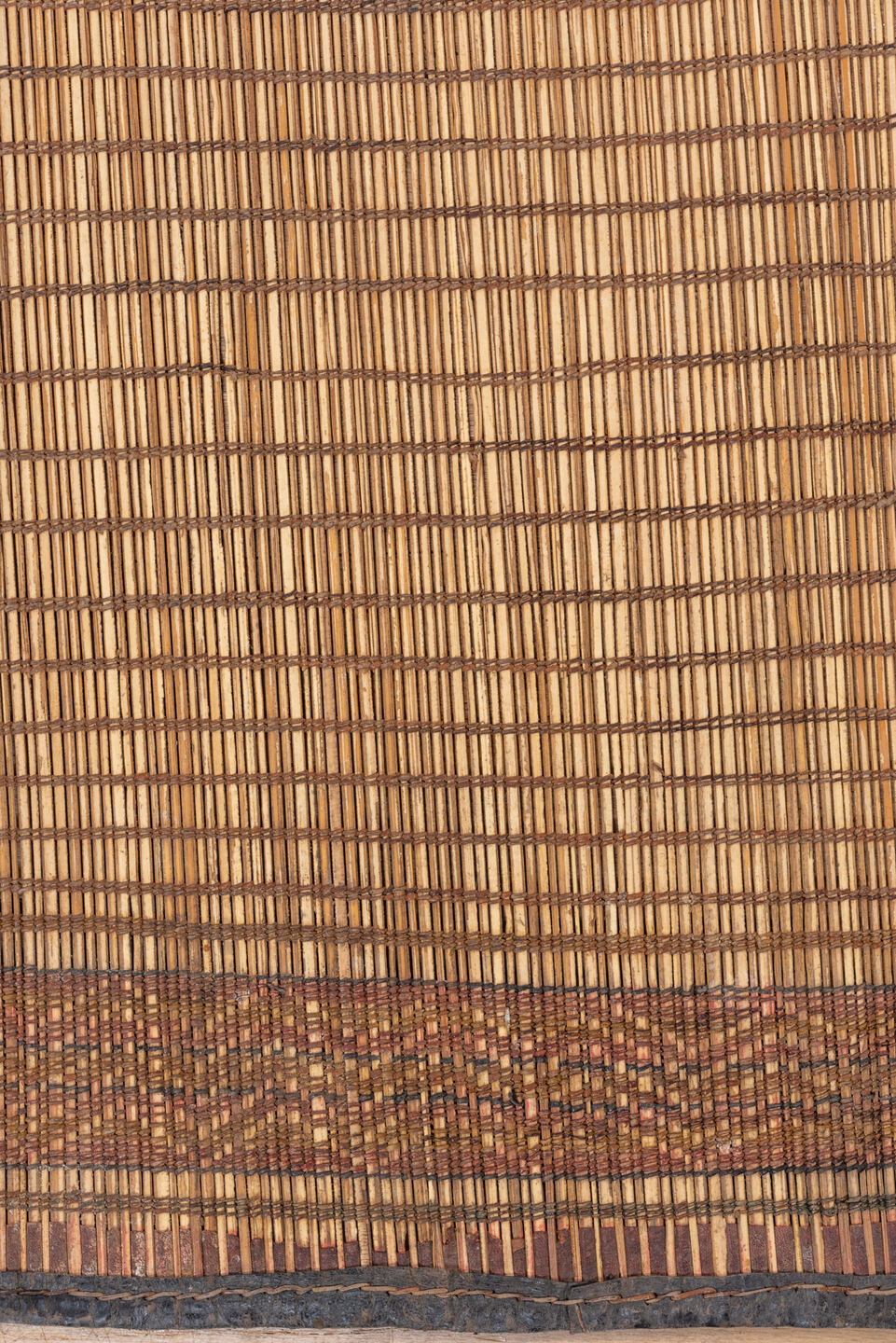 6' x 8' one-of-a-kind handmade vintage Tuareg medium size rug. Color palette: black, brown, gray, off-white, orange