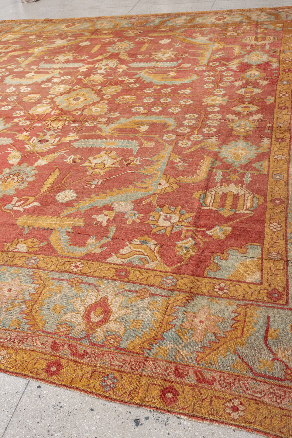 13' x 13' one-of-a-kind handmade antique Oushak oversize rug. Color palette: terracotta, aqua, gold, ivory, camel, sage