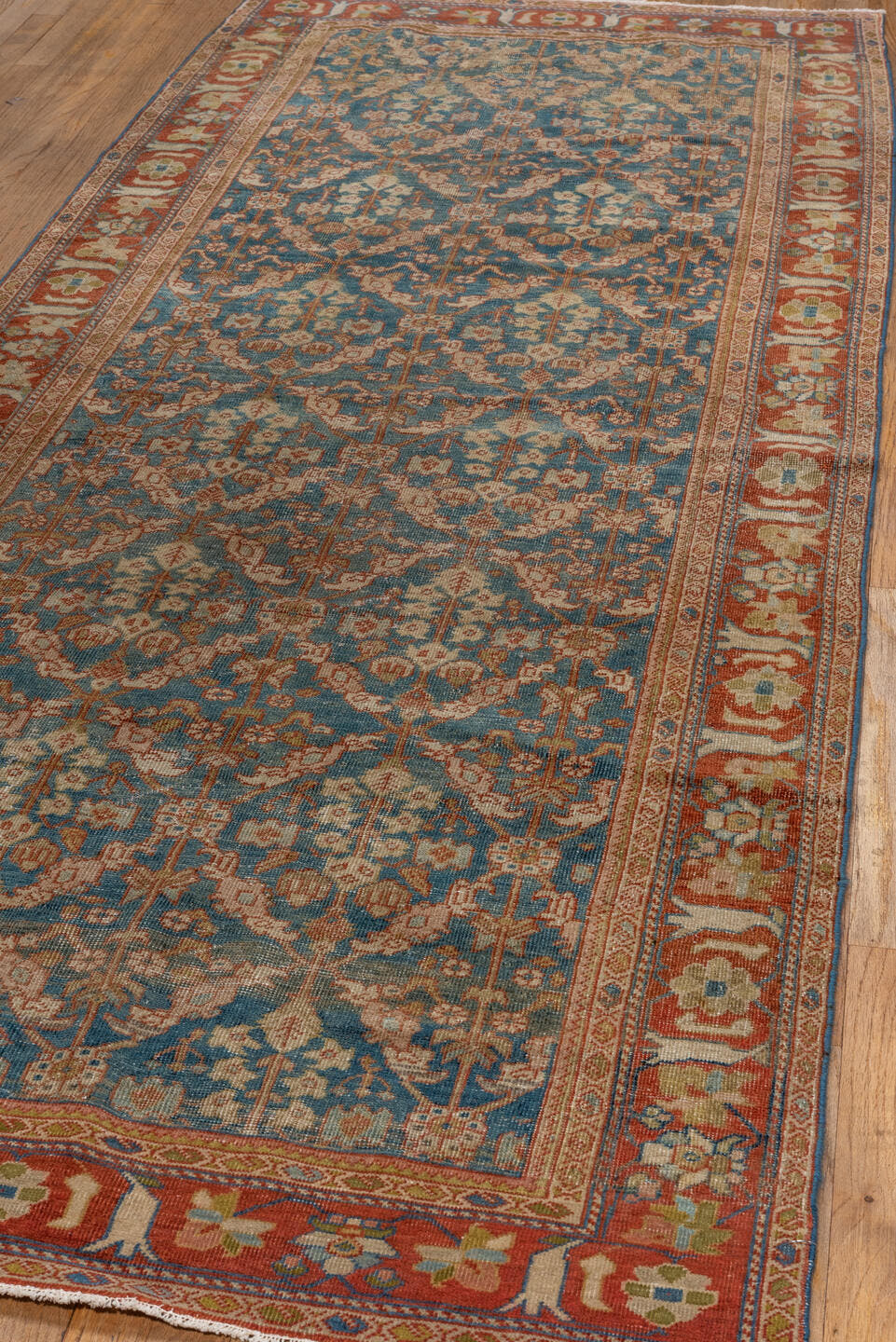 3' x 9' one-of-a-kind handmade antique Mahal runner rug. Color palette: blue, rust, ivory, camel, taupe, sage, gold