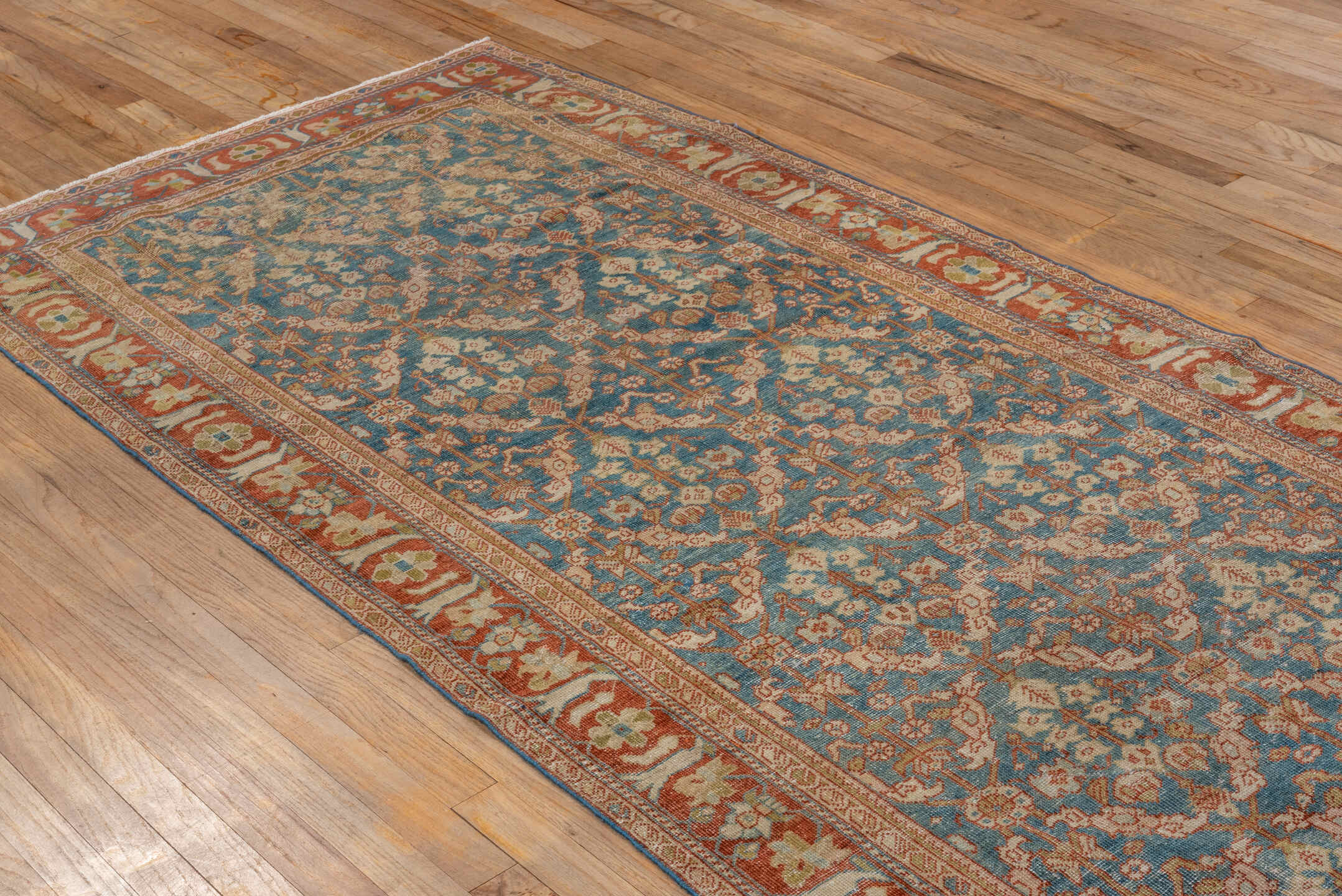 3' x 9' one-of-a-kind handmade antique Mahal runner rug. Color palette: blue, rust, ivory, camel, taupe, sage, gold