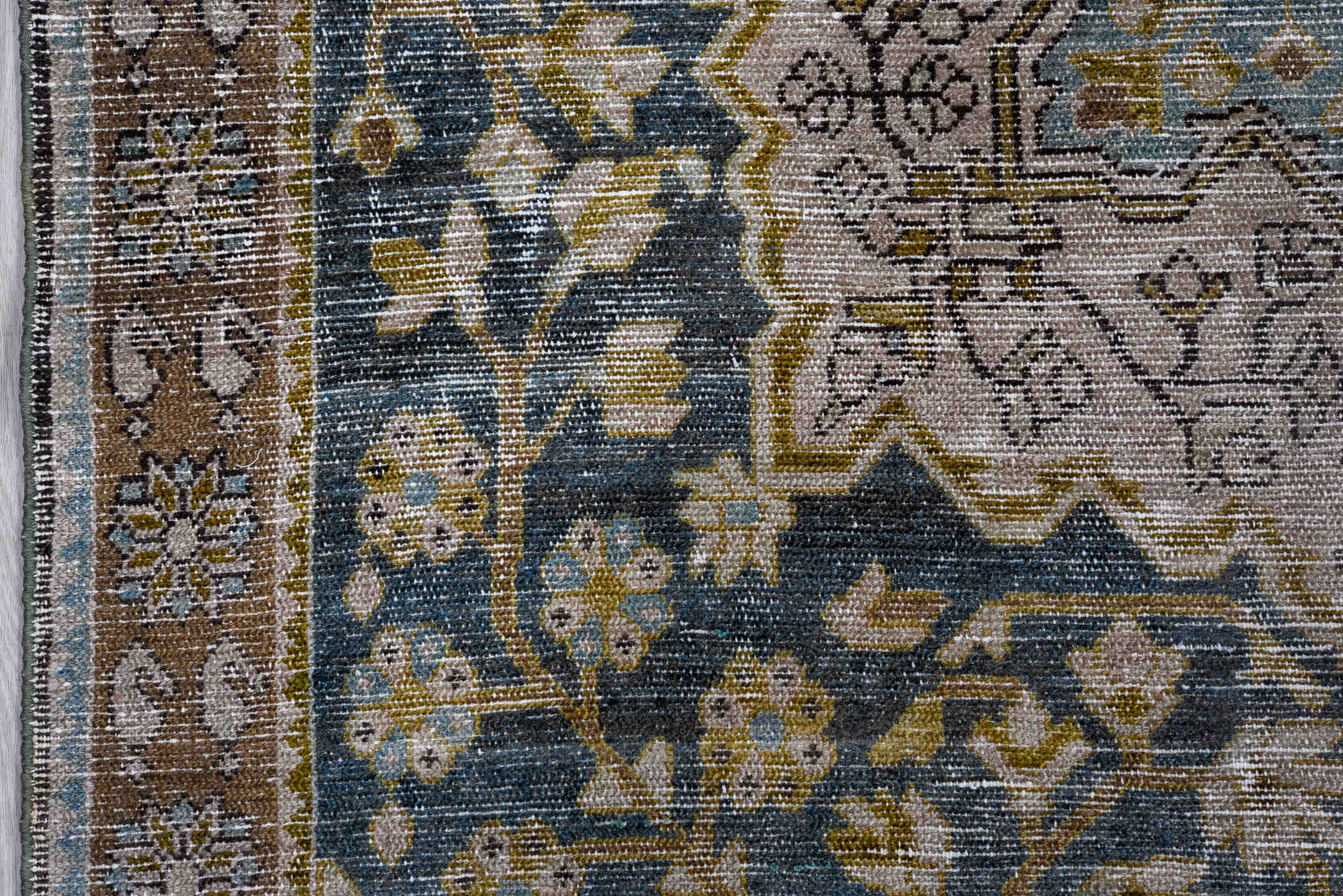 4' x 7' one-of-a-kind handmade antique Malayer rug. Color palette: ivory, indigo, brown, sky blue, taupe, olive, purple