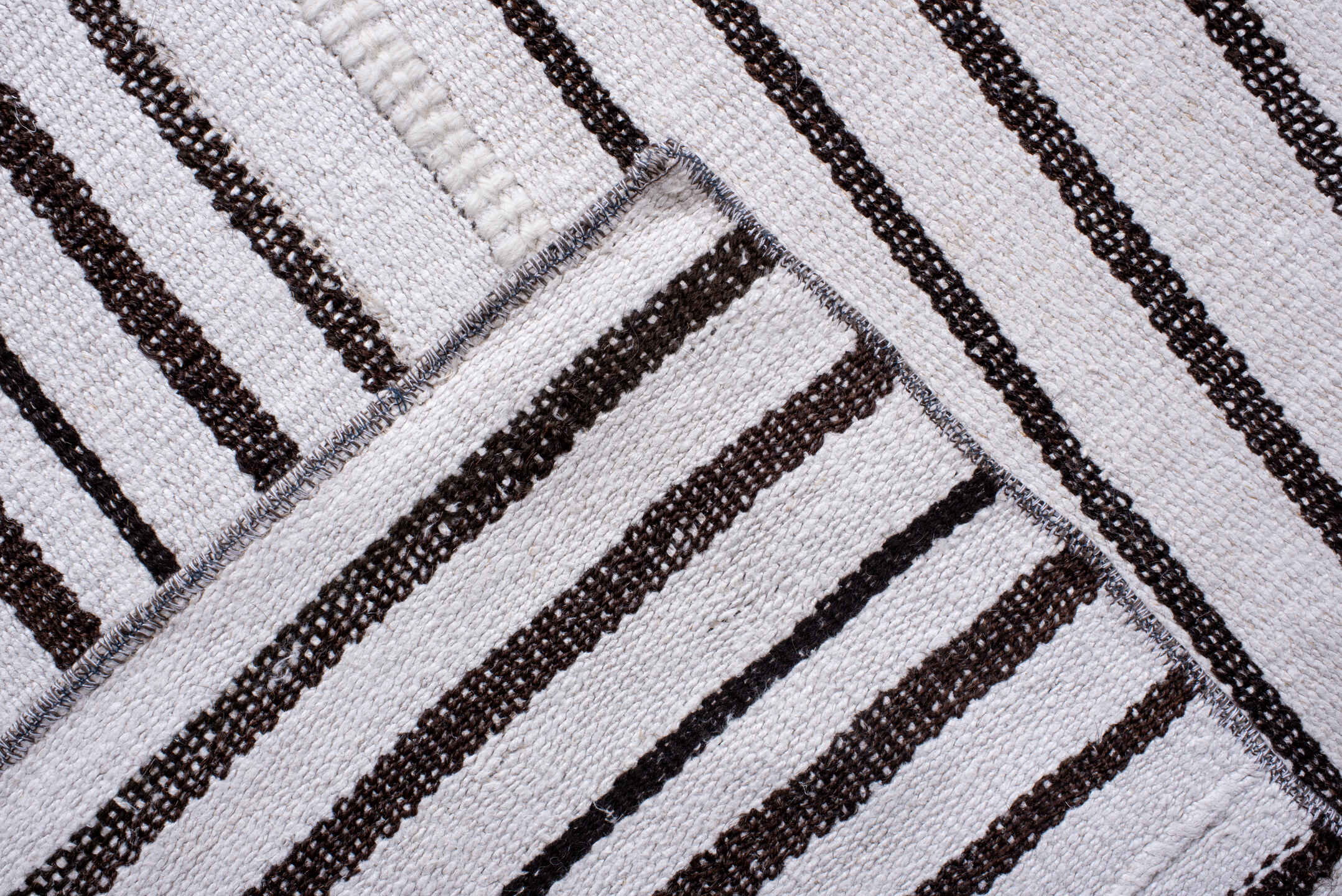 11' x 16' one-of-a-kind handmade antique Flatweave oversize rug. Color palette: ivory, charcoal, gray, black