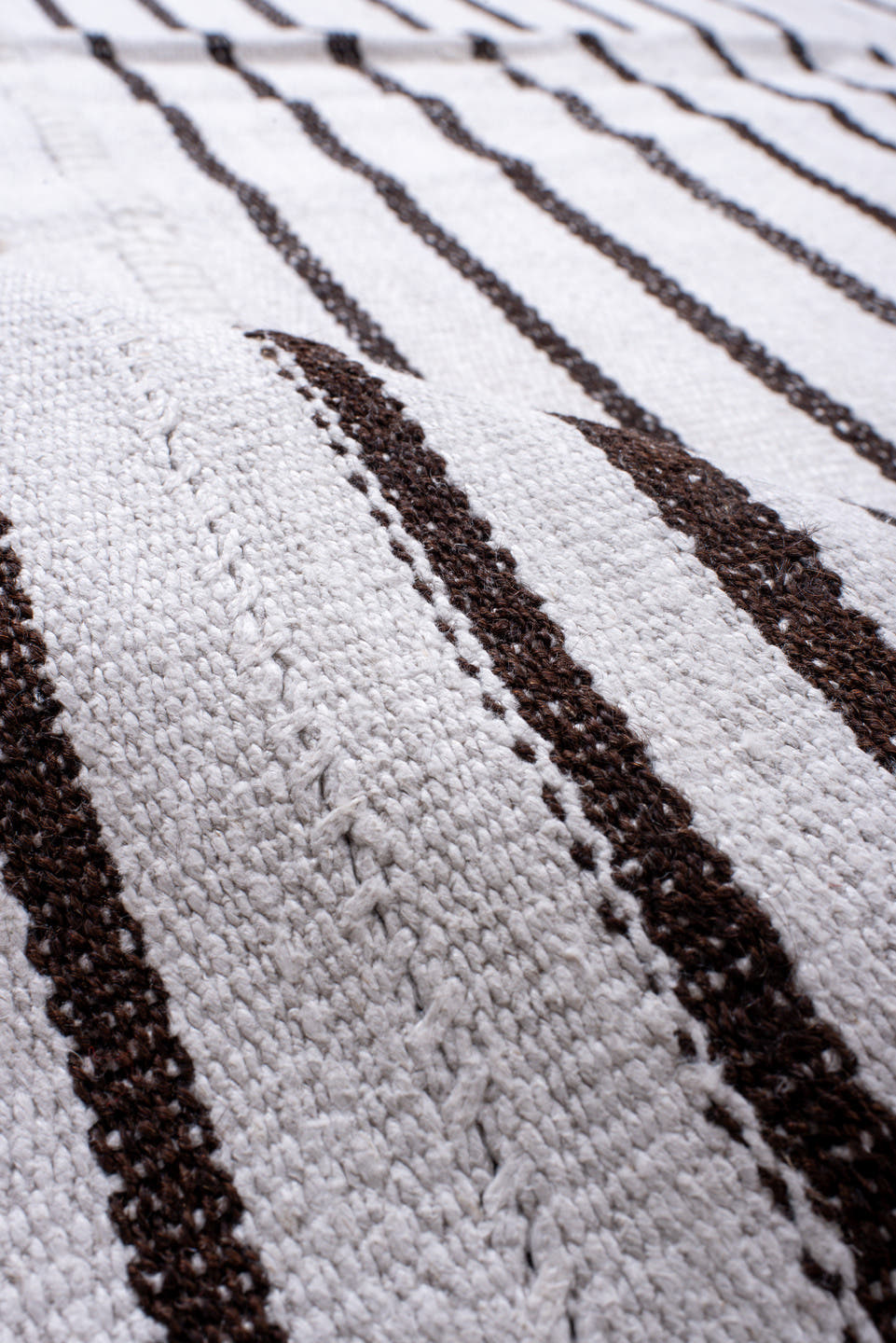 11' x 16' one-of-a-kind handmade antique Flatweave oversize rug. Color palette: ivory, charcoal, gray, black