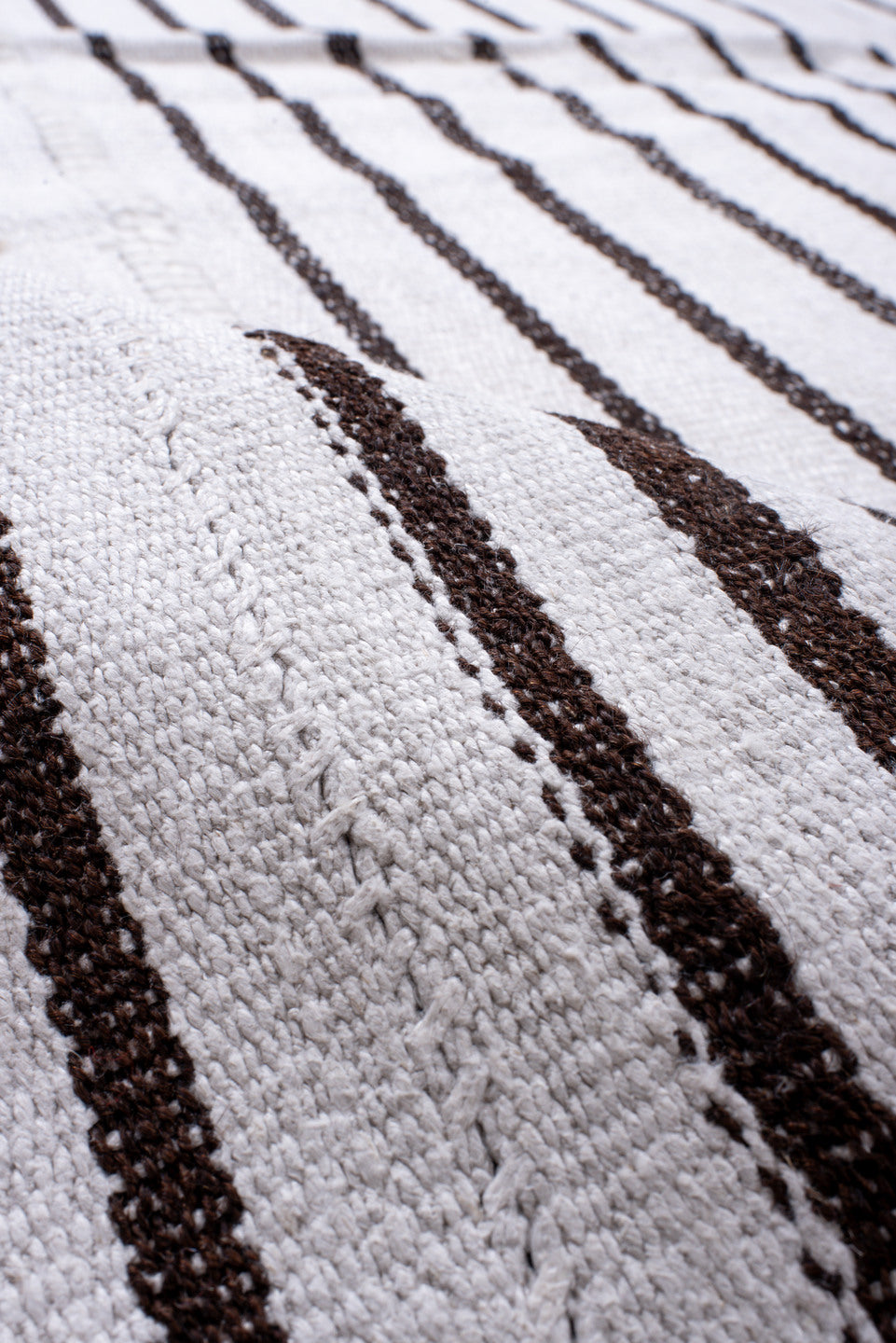 11' x 16' one-of-a-kind handmade antique Flatweave oversize rug. Color palette: ivory, charcoal, gray, black