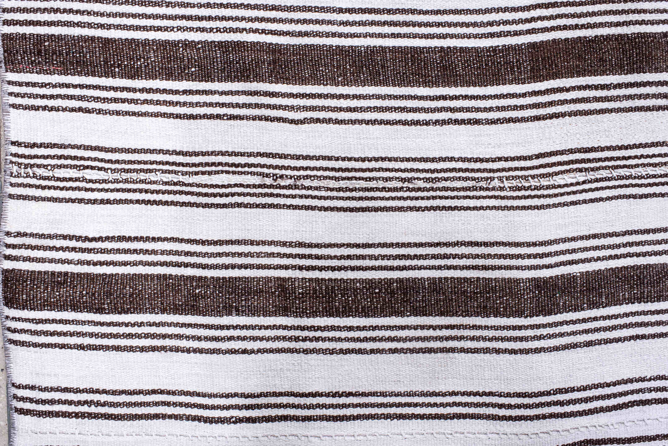 12' x 18' one-of-a-kind handmade antique Flatweave oversize rug. Color palette: ivory, dark brown, brown