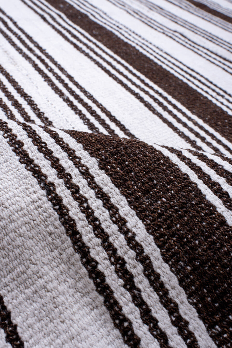 12' x 18' one-of-a-kind handmade antique Flatweave oversize rug. Color palette: ivory, dark brown, brown
