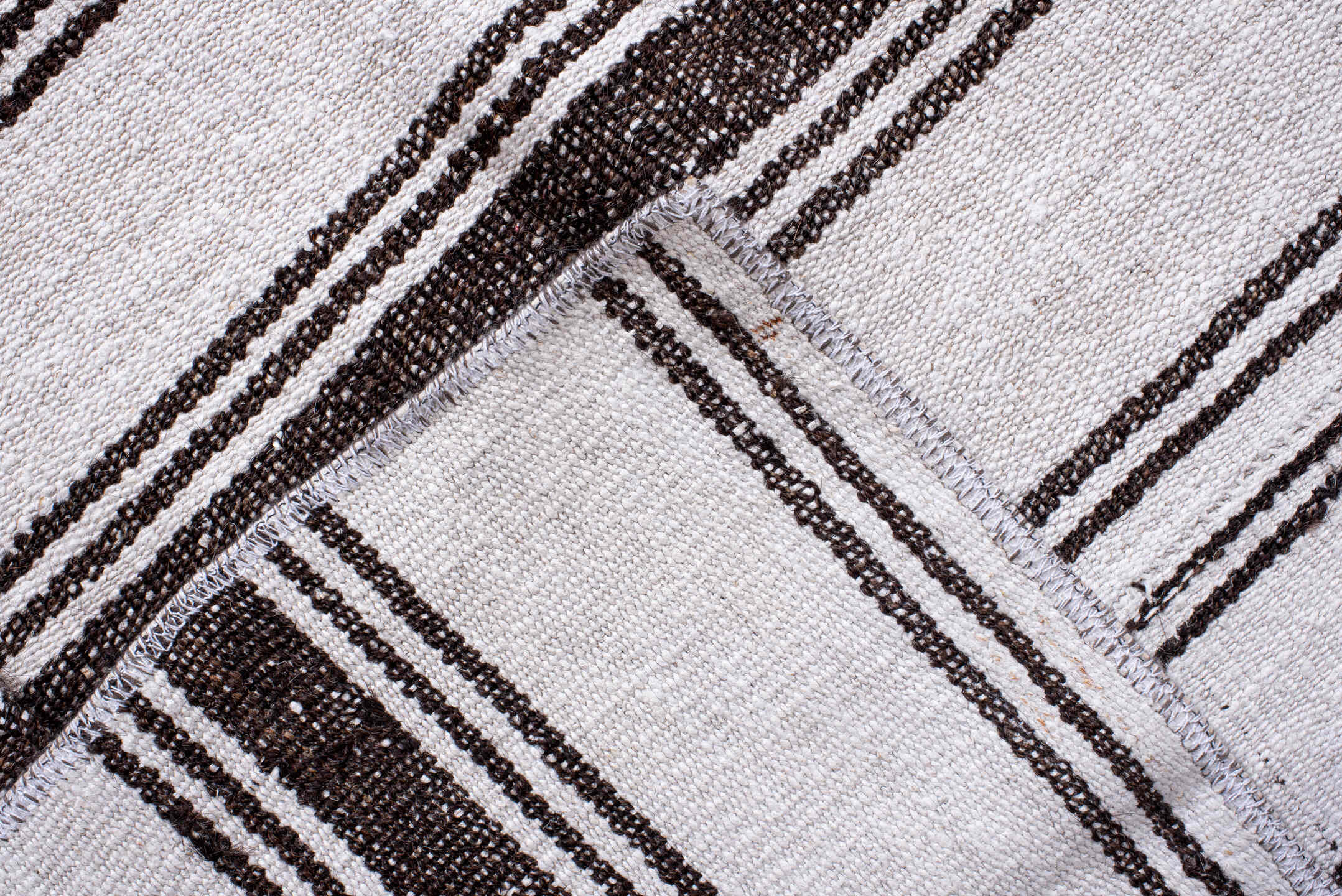 12' x 16' one-of-a-kind handmade antique Flatweave oversize rug. Color palette: ivory, charcoal, gray, black