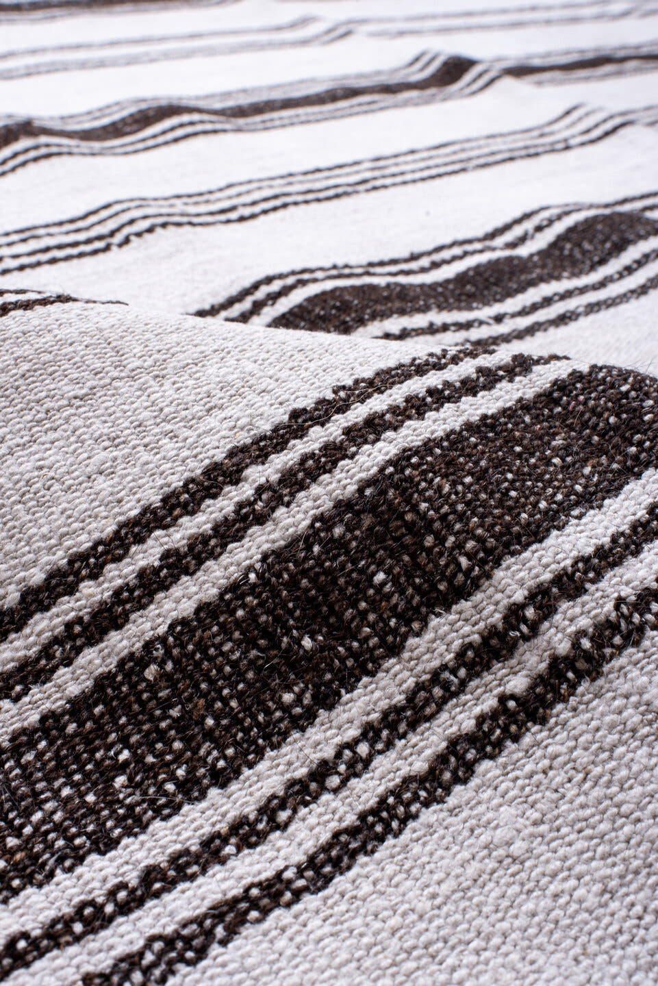 12' x 16' one-of-a-kind handmade antique Flatweave oversize rug. Color palette: ivory, charcoal, gray, black
