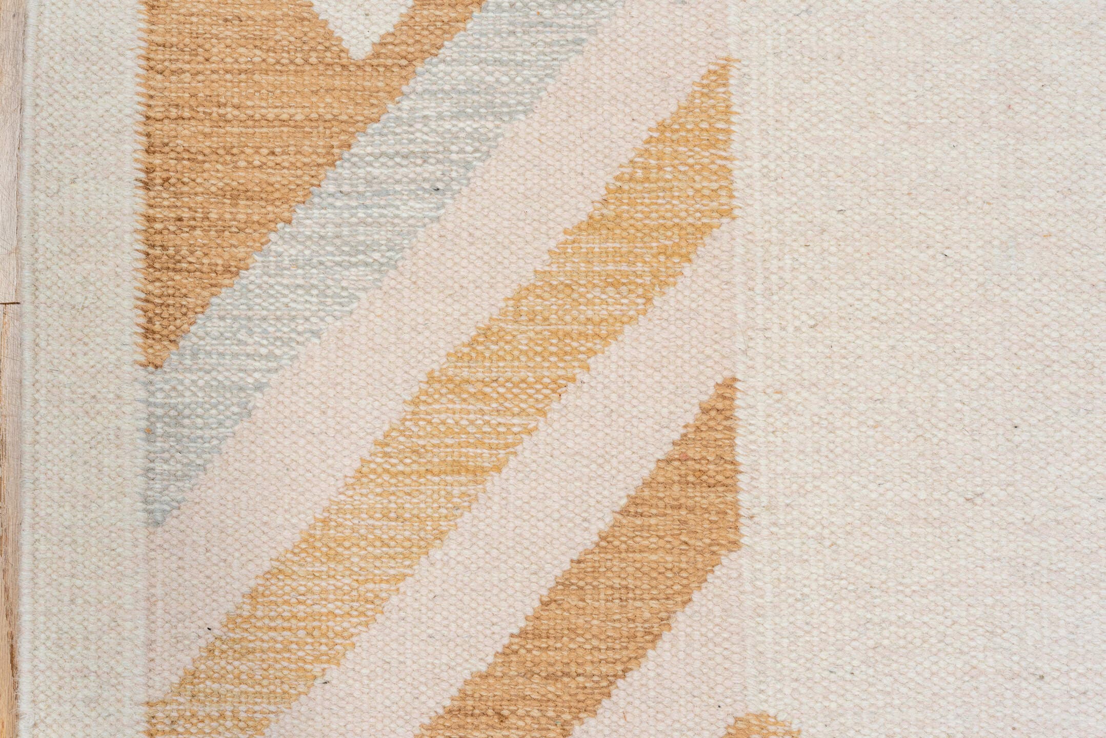 5' x 7' one-of-a-kind handmade vintage Rollaken rug. Color palette: ivory, camel, cream, pale_blue, beige, light blue