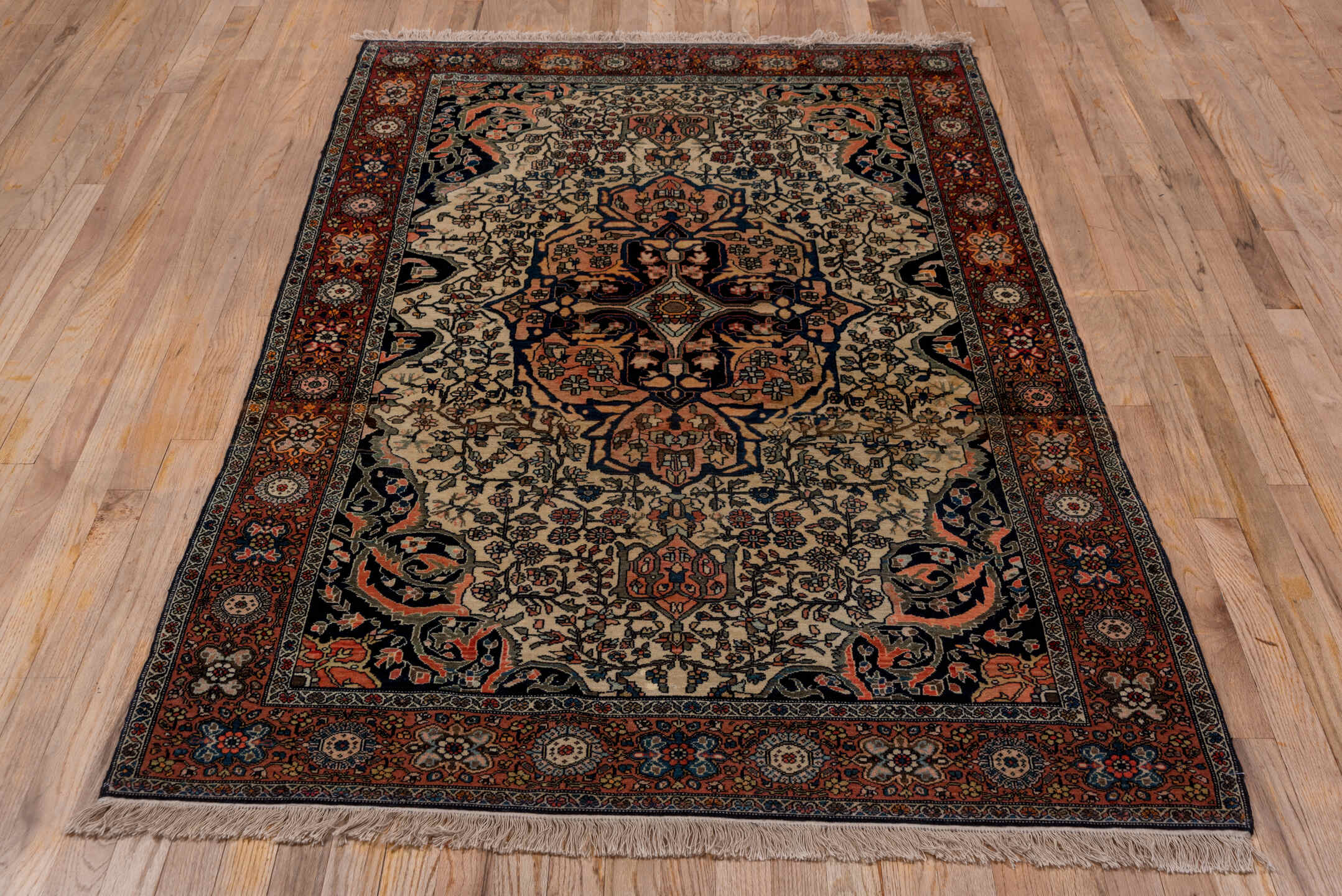 4' x 6' one-of-a-kind handmade antique Far.Sarouk small size rug. Color palette: ivory, rust, navy, rose, charcoal, coral
