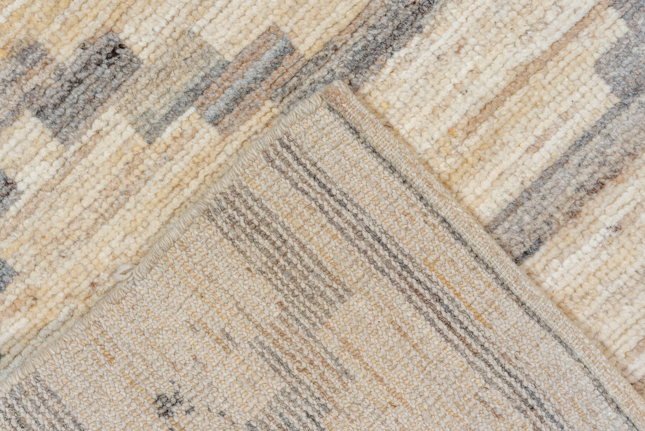 8' x 9' one-of-a-kind handmade vintage Afghan rug. Color palette: ivory, gray, charcoal, cream, taupe, black, beige