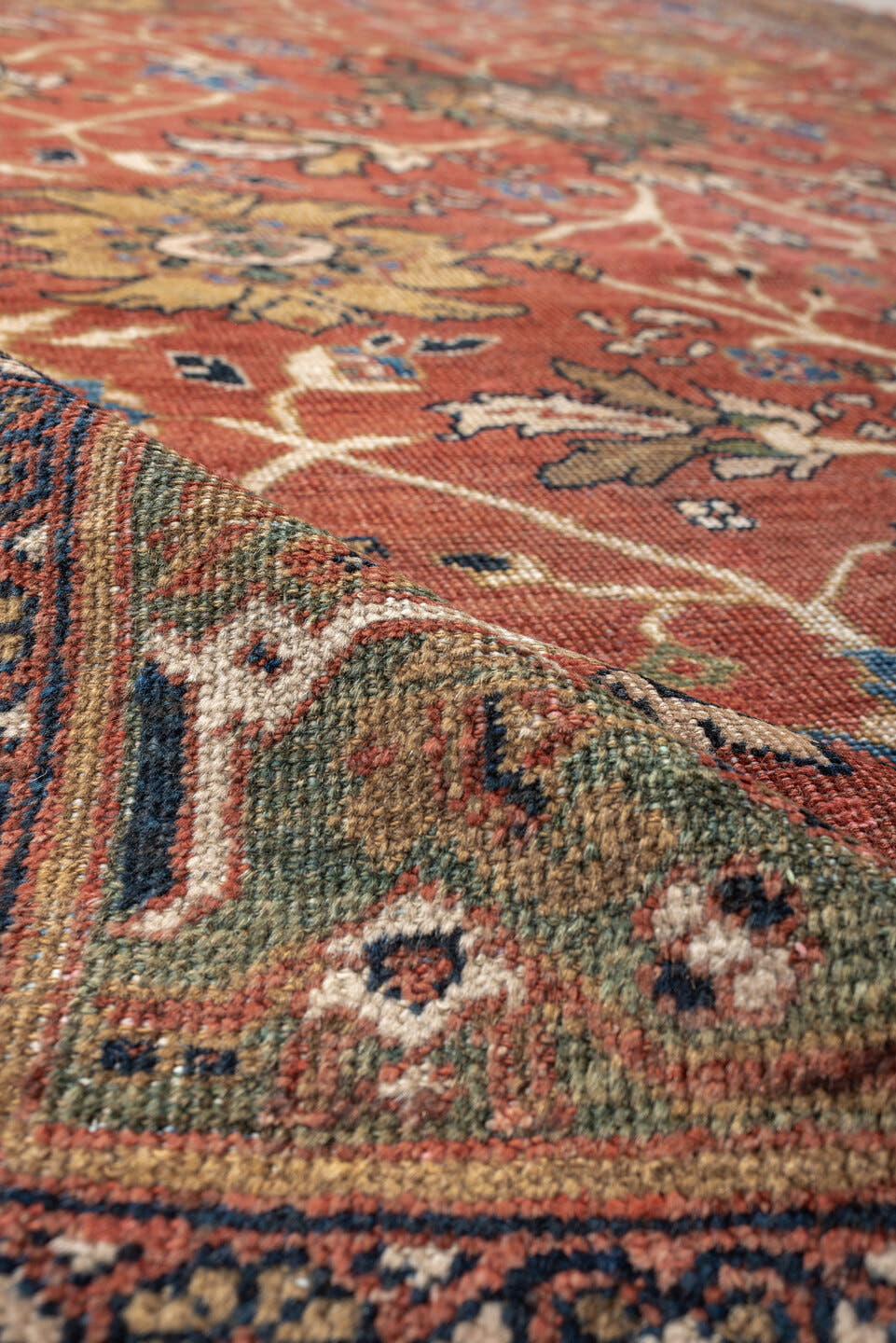 8' x 12' one-of-a-kind handmade vintage Sultanabad large size rug. Color palette: terracotta, sage, ivory, gold, navy
