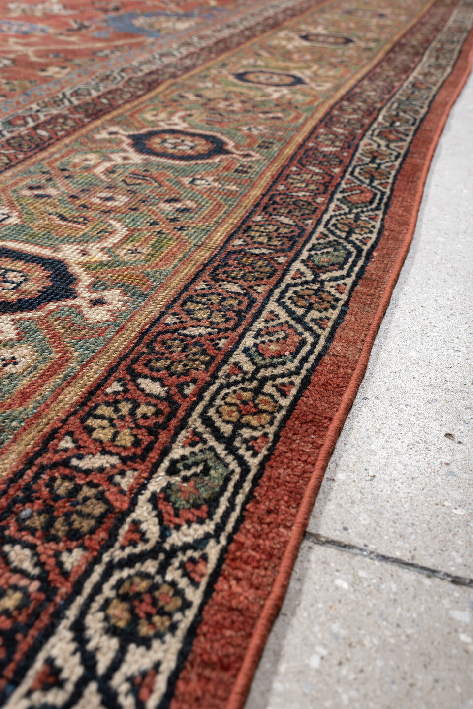 8' x 12' one-of-a-kind handmade vintage Sultanabad large size rug. Color palette: terracotta, sage, ivory, gold, navy