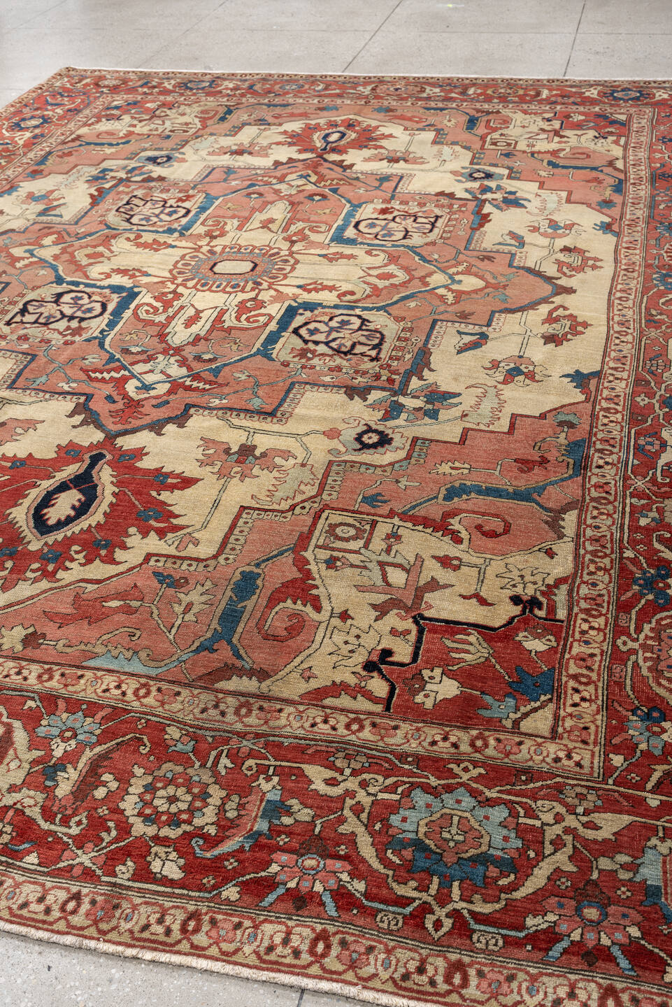 9' x 12' one-of-a-kind handmade vintage Serapi large size rug. Color palette: ivory, terracotta, rose, deep blue, rust