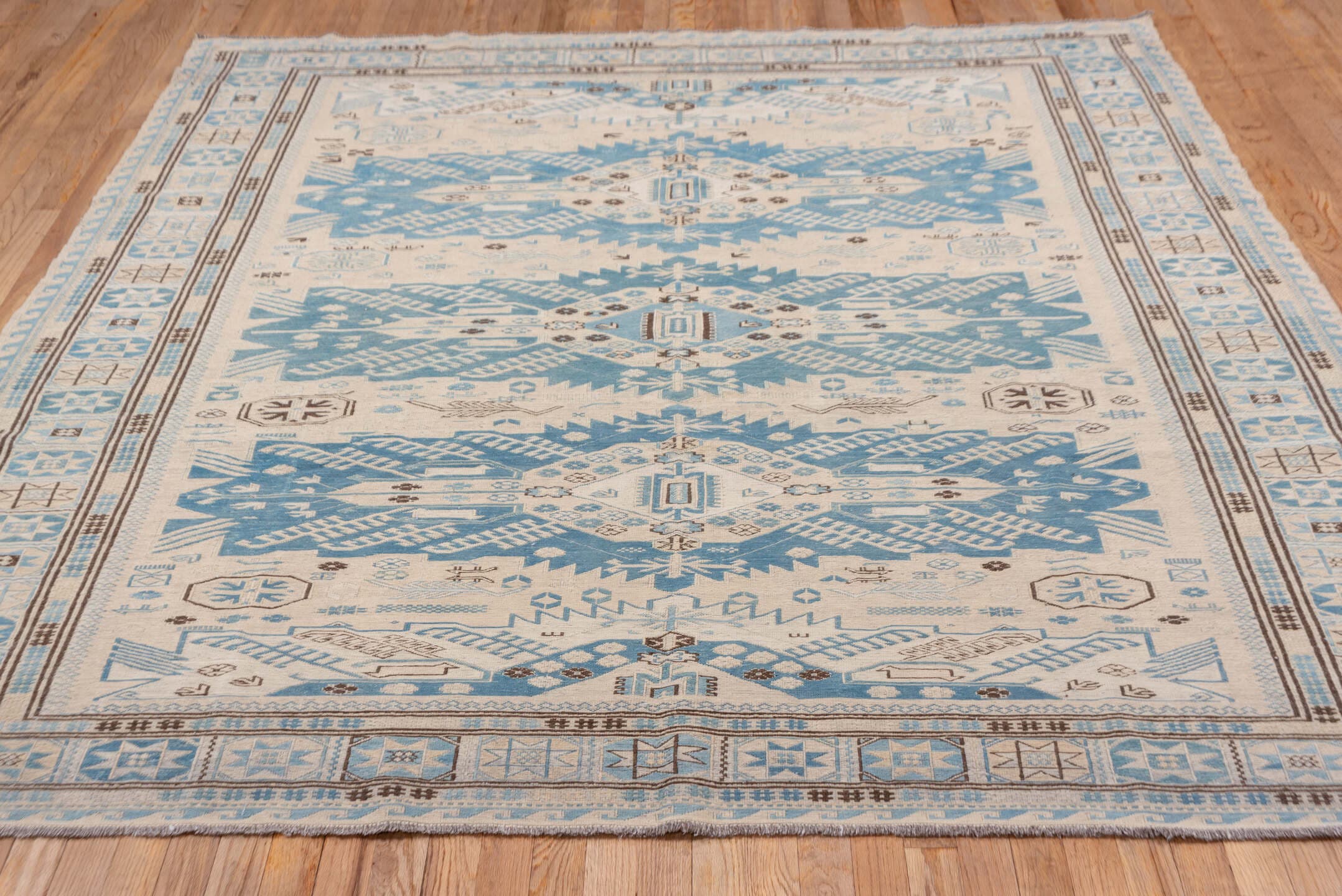 7' x 7' one-of-a-kind handmade vintage Sumak rug. Color palette: ivory, sky blue, taupe, brown, light blue, beige, gray