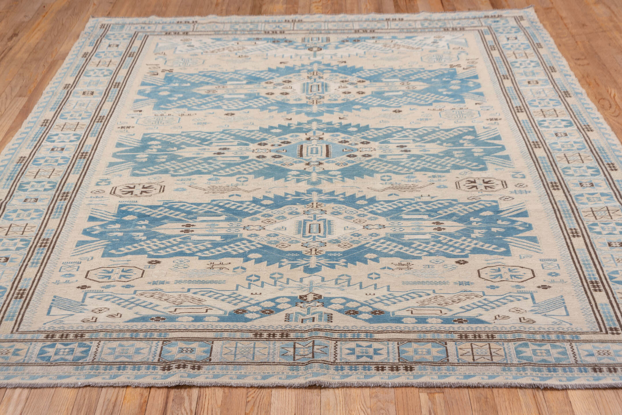 7' x 7' one-of-a-kind handmade vintage Sumak rug. Color palette: blue, dark gray, gray, light blue, light gray