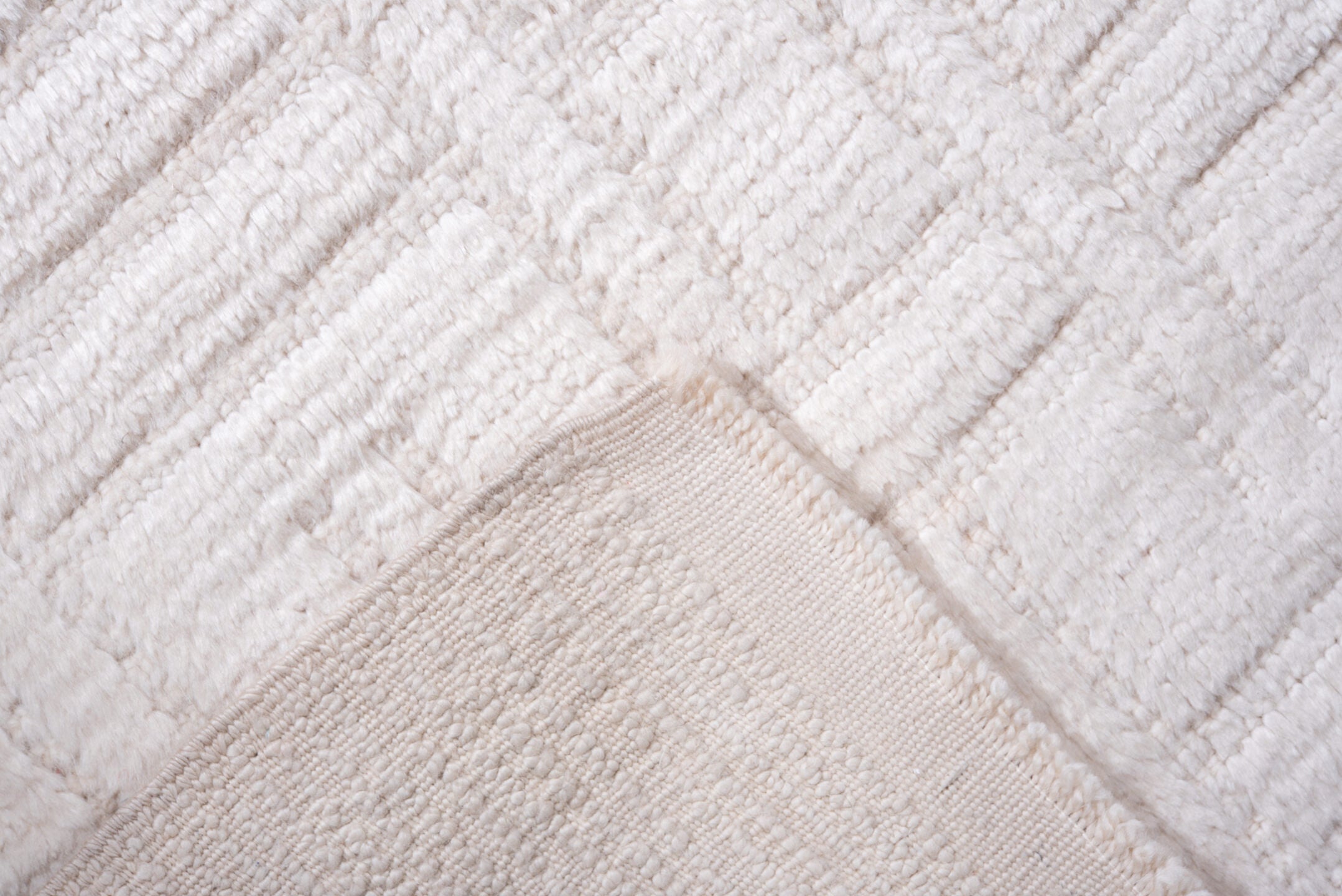 4' x 7' one-of-a-kind handmade vintage Tulu rug. Color palette: ivory, cream, beige