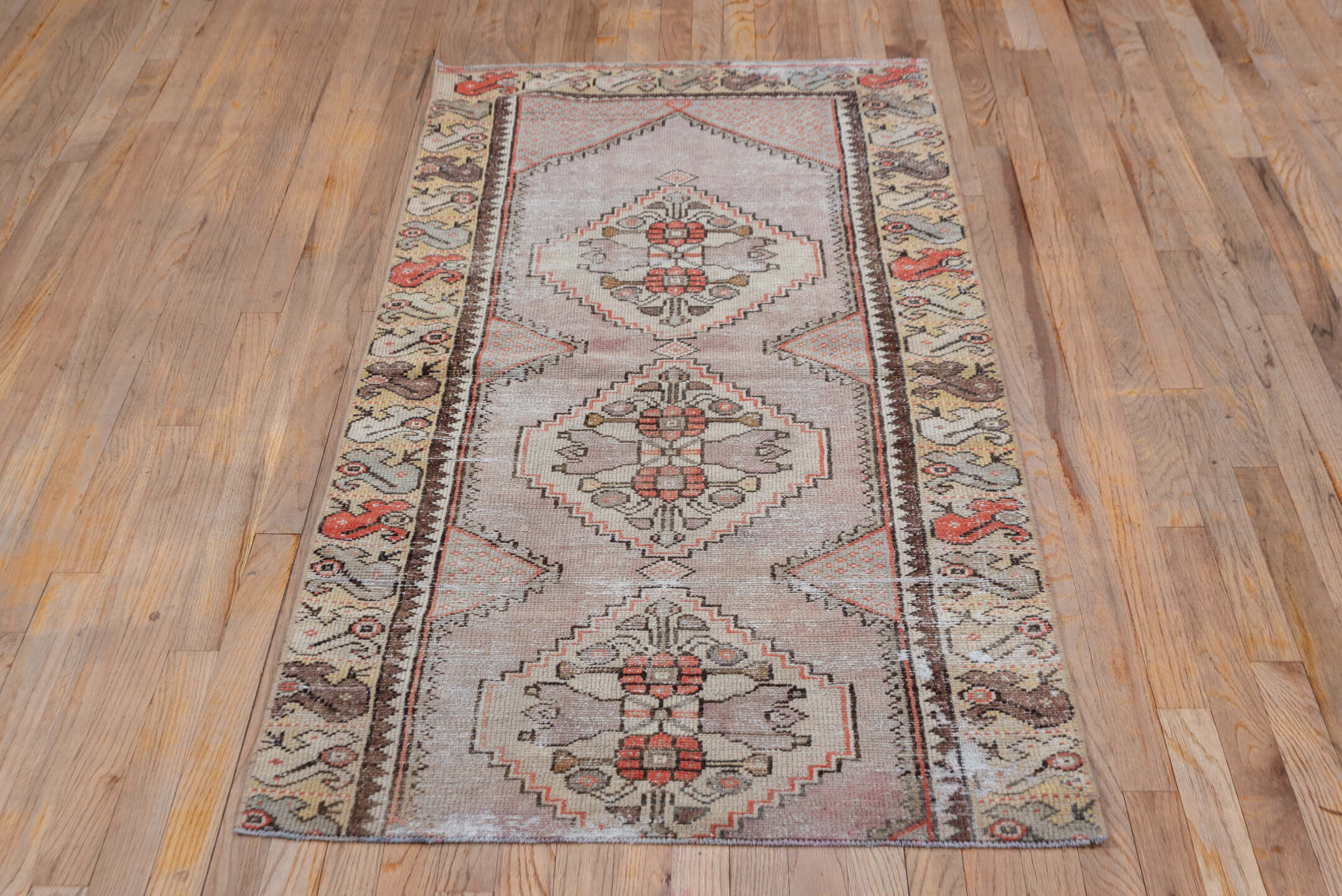 2' x 6' one-of-a-kind handmade vintage Oushak runner rug. Color palette: brown, gray, light gray, pink