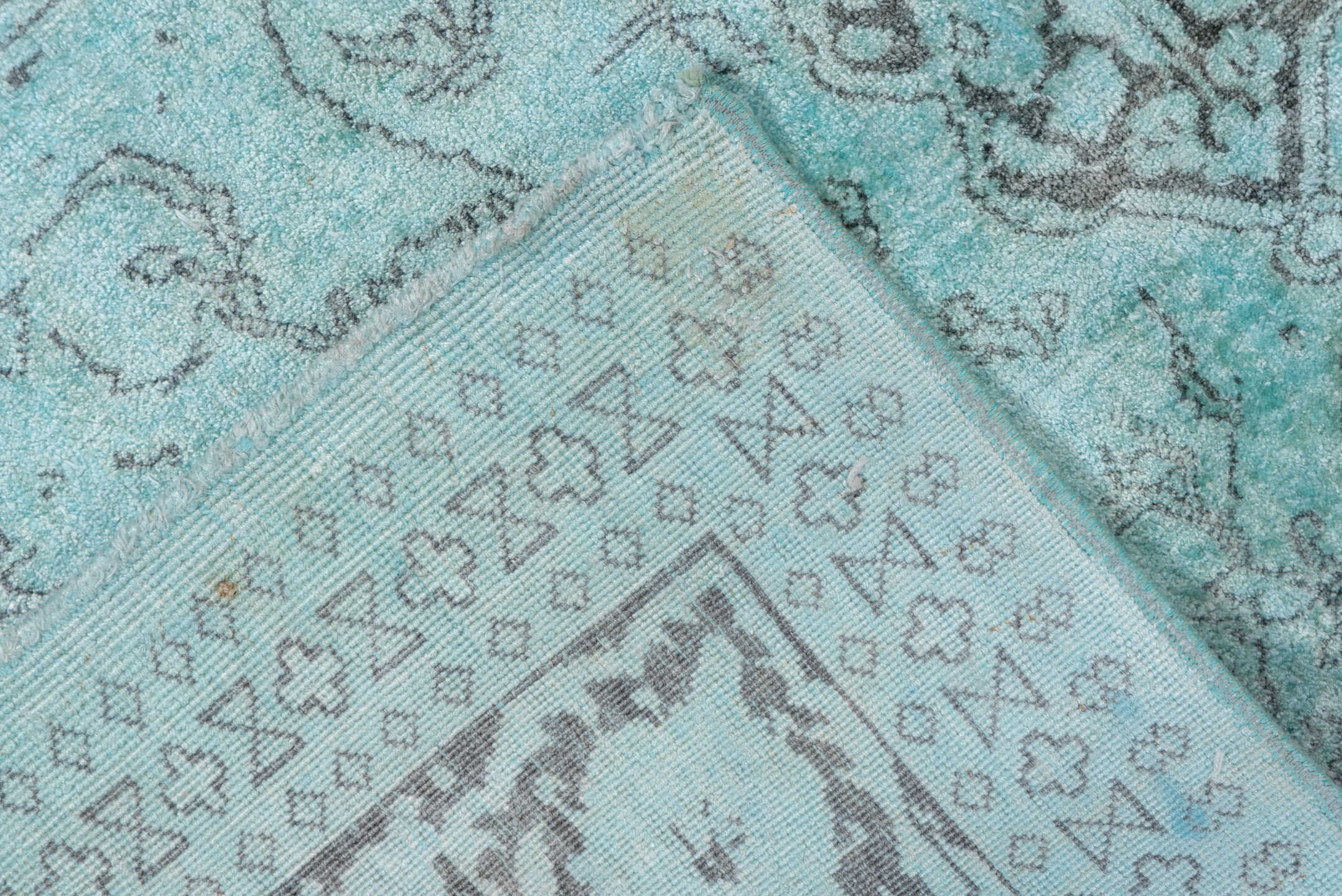 4' x 7' one-of-a-kind handmade vintage Overdyed rug. Color palette: aqua, ivory, silver, taupe, gray, teal, beige