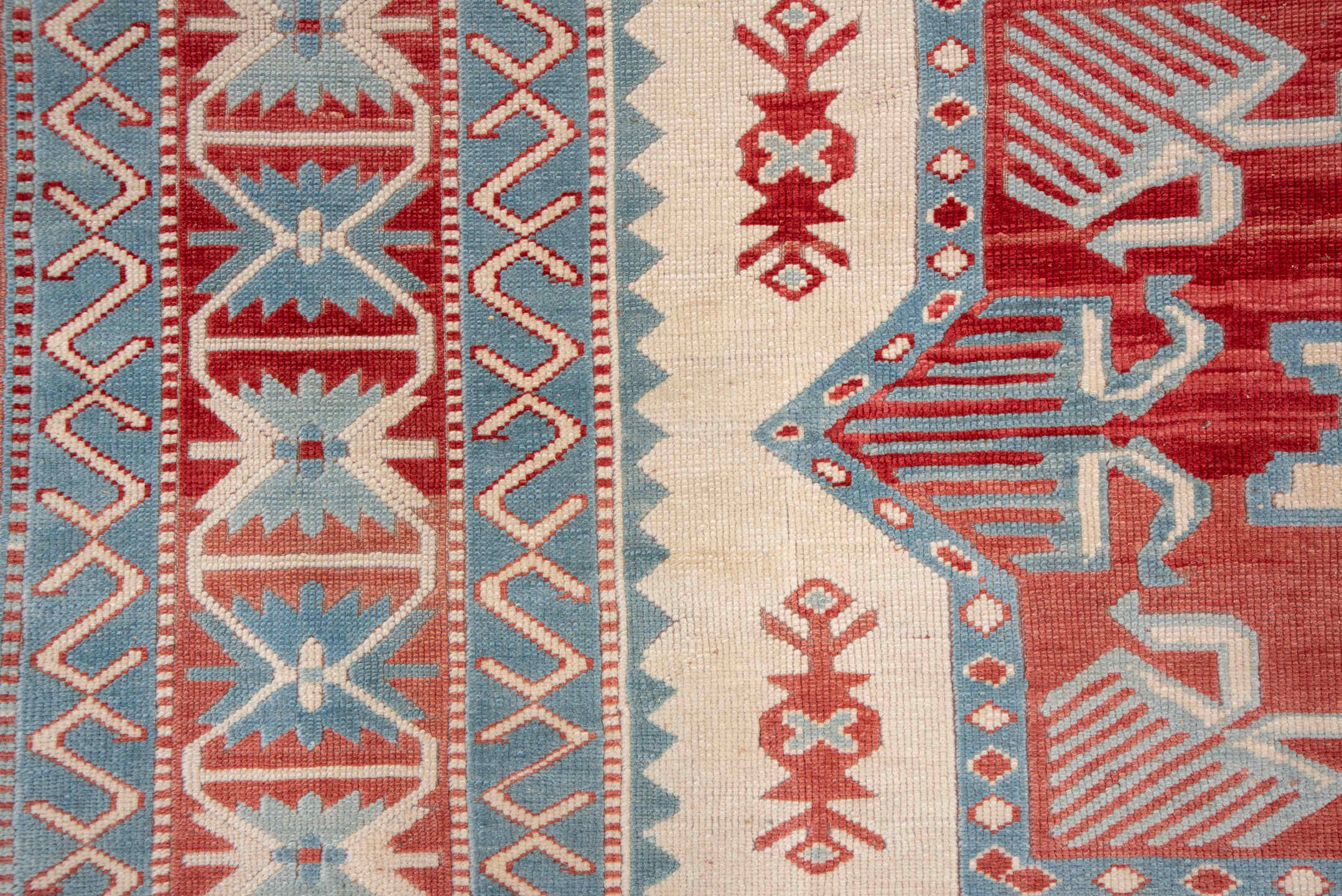 7' x 9' one-of-a-kind handmade vintage Oushak rug. Color palette: ivory, sky blue, rust, brick red, cream, light blue
