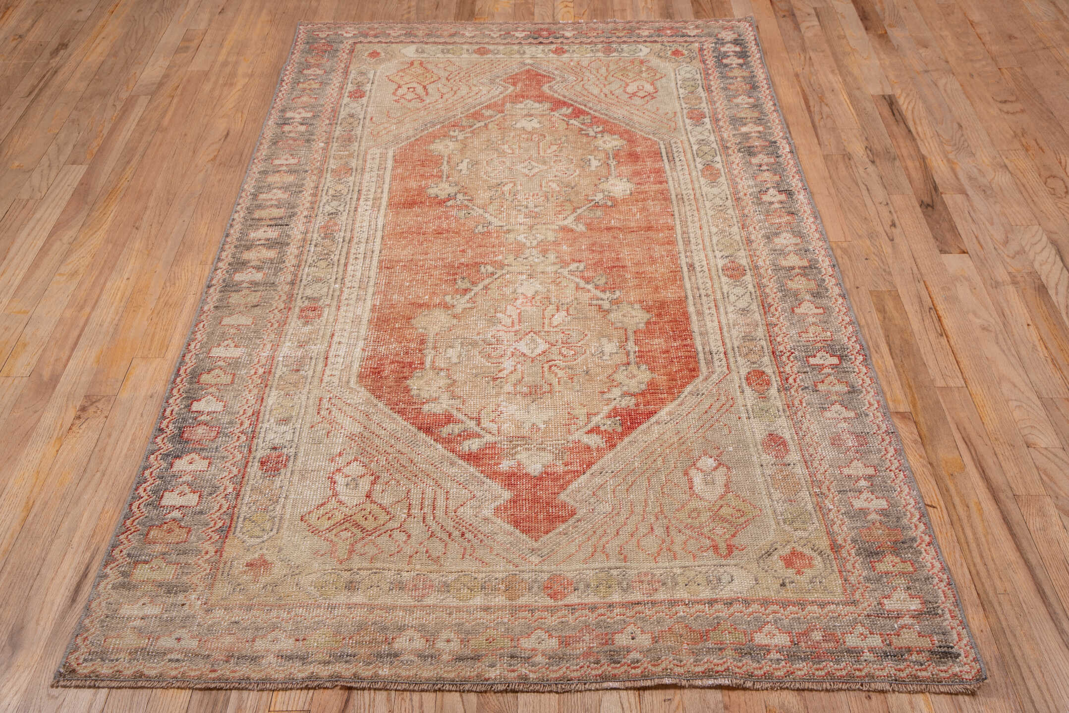 4' x 7' one-of-a-kind handmade vintage Oushak rug. Color palette: coral, ivory, gray, taupe, rose, slate, terracotta, beige