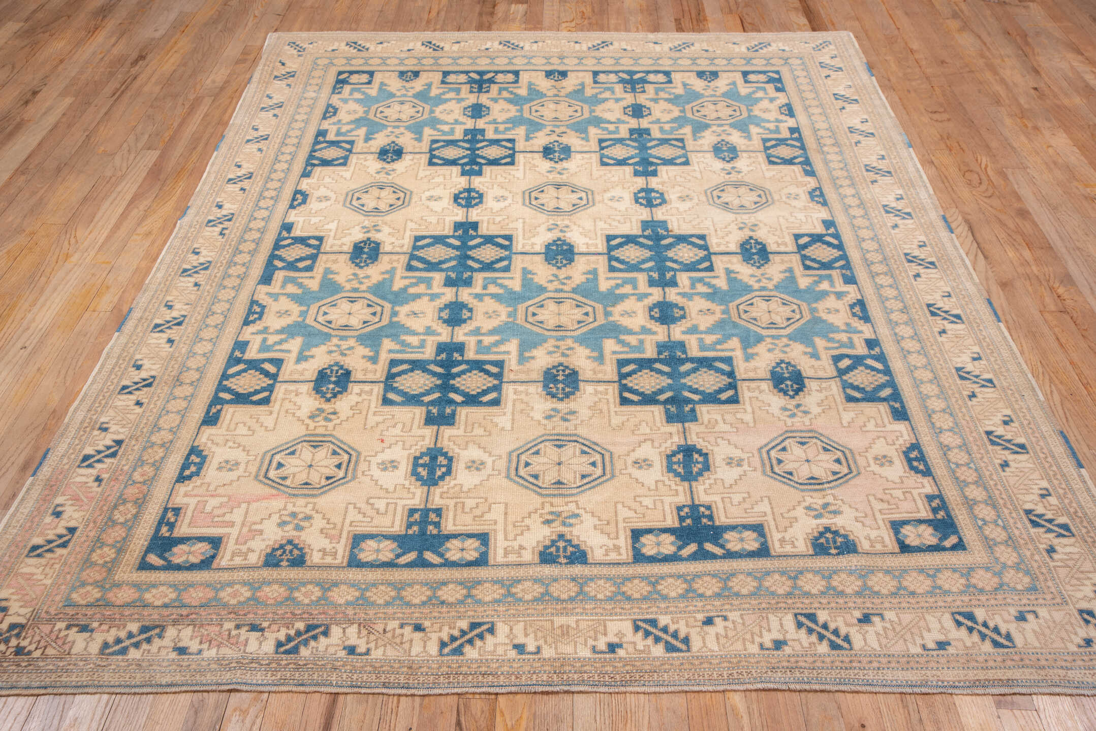 6' x 8' one-of-a-kind handmade vintage Oushak medium size rug. Color palette: ivory, pale blue, beige, taupe, camel