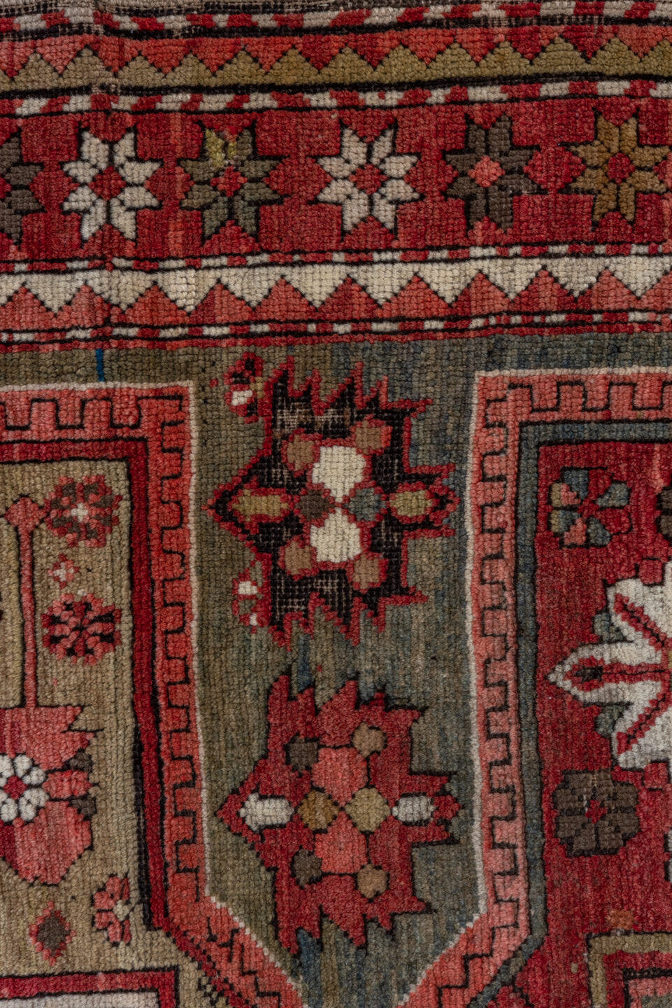 3' x 8' one-of-a-kind handmade vintage Kazak runner rug. Color palette: red, ivory, brown, blue, charcoal, rust, rose, taupe