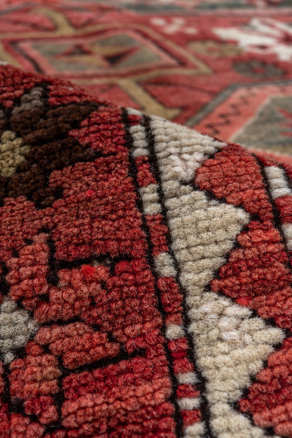 3' x 8' one-of-a-kind handmade vintage Kazak runner rug. Color palette: red, ivory, brown, blue, charcoal, rust, rose, taupe