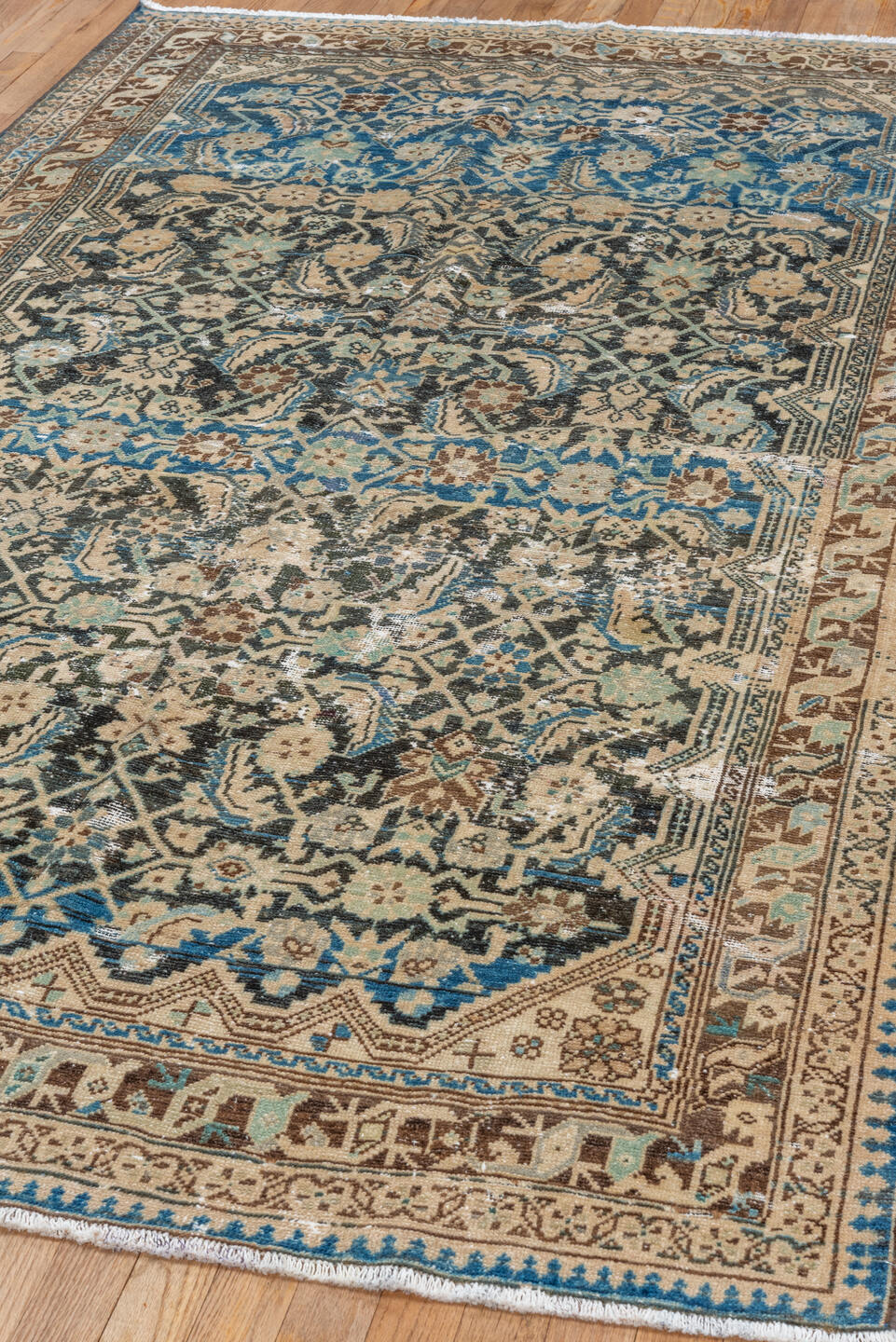 4' x 8' one-of-a-kind handmade vintage Malayer rug. Color palette: black, blue, brown, gray, light gray, off-white, orange