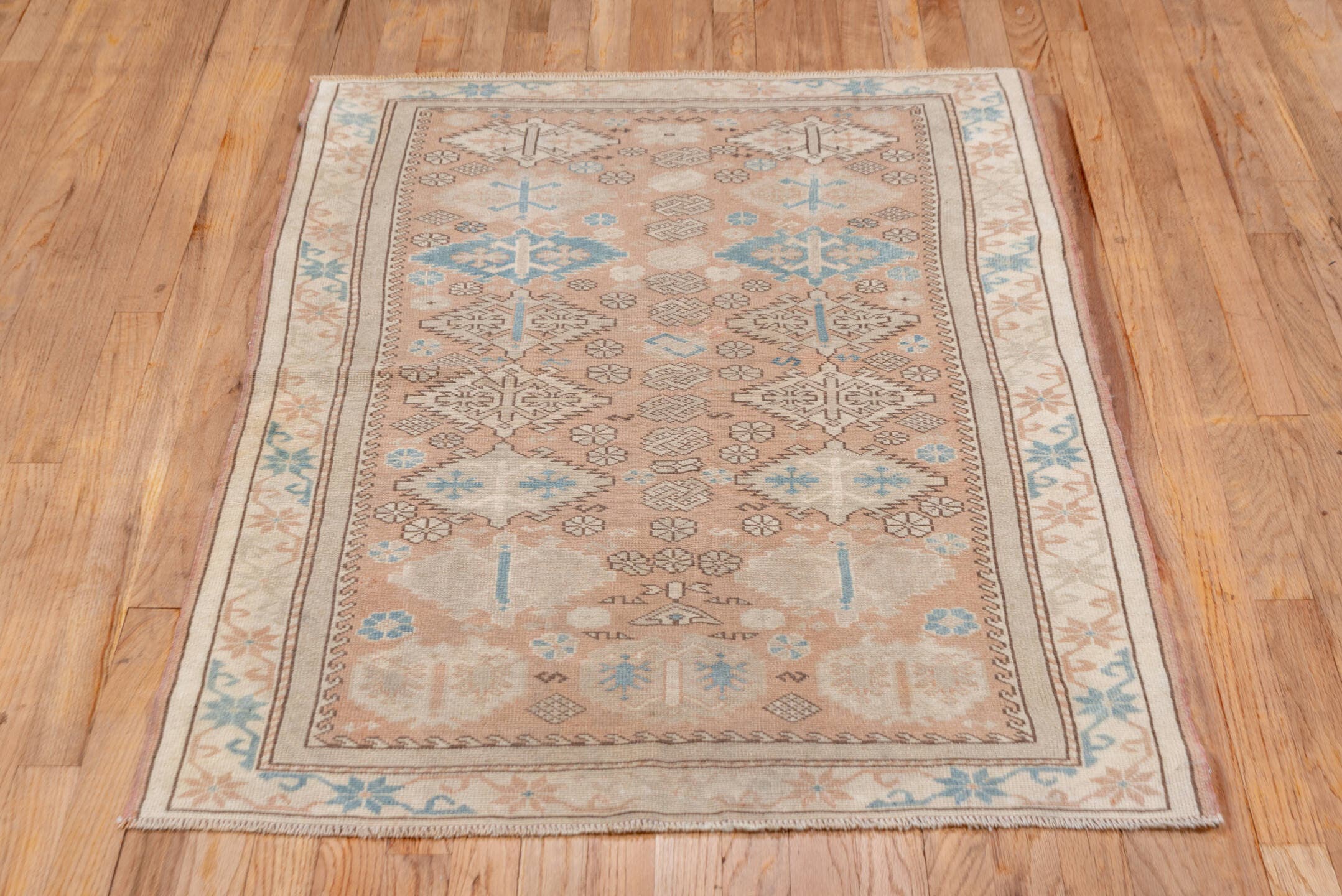 3' x 4' one-of-a-kind handmade vintage Oushak small size rug. Color palette: blush, ivory, pale blue, cream, taupe, camel