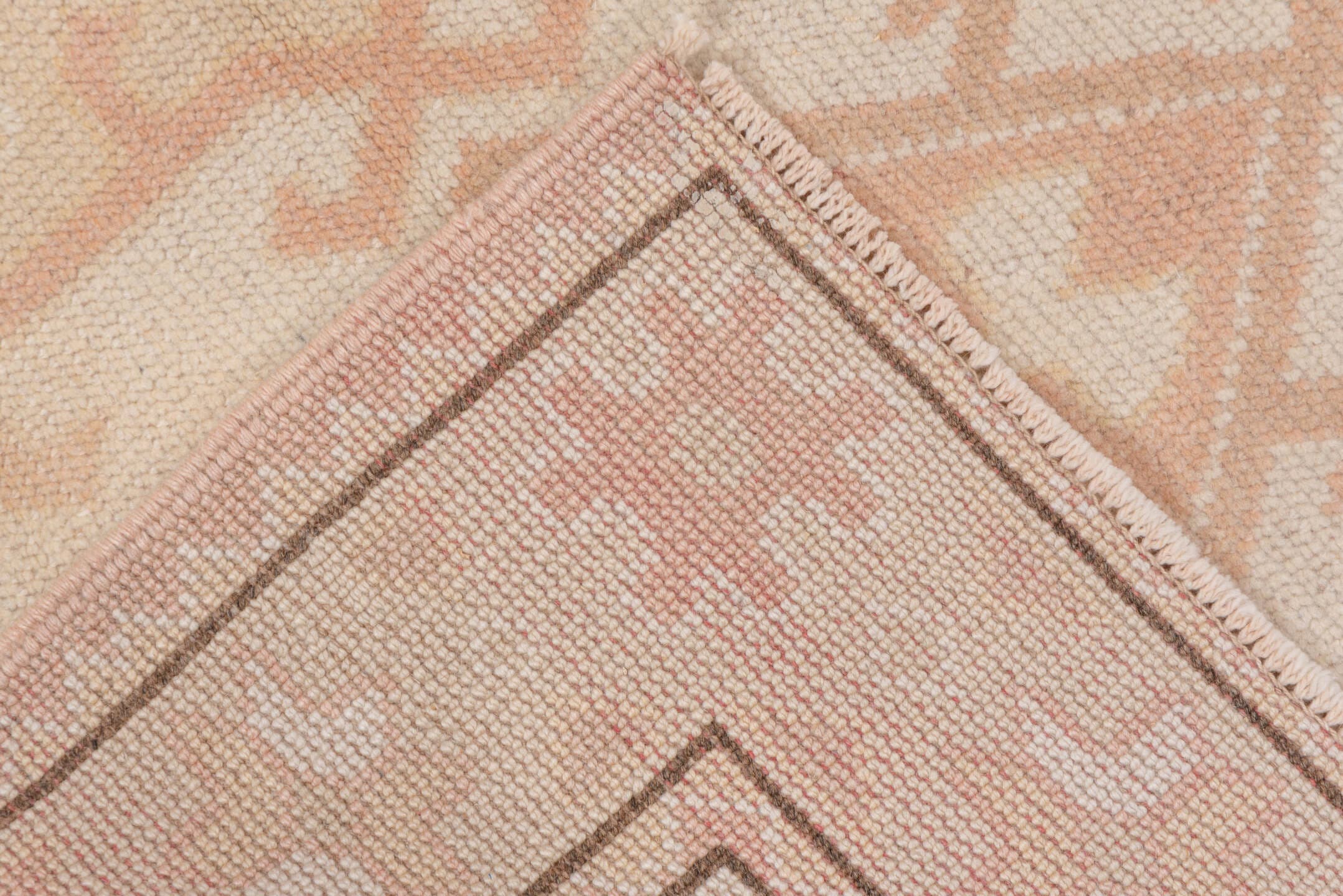 2' x 4' one-of-a-kind handmade vintage Oushak small size rug. Color palette: ivory, blush, peach, taupe, camel, pink