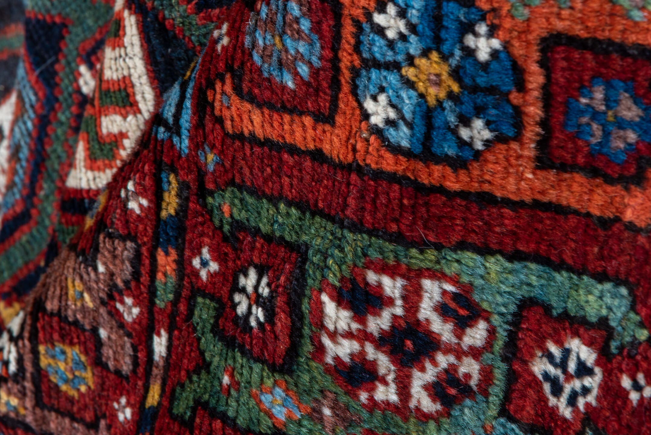 5' x 11' one-of-a-kind handmade vintage Baktiary rug. Color palette: navy, rust, ivory, indigo, gold, terra cotta, brown