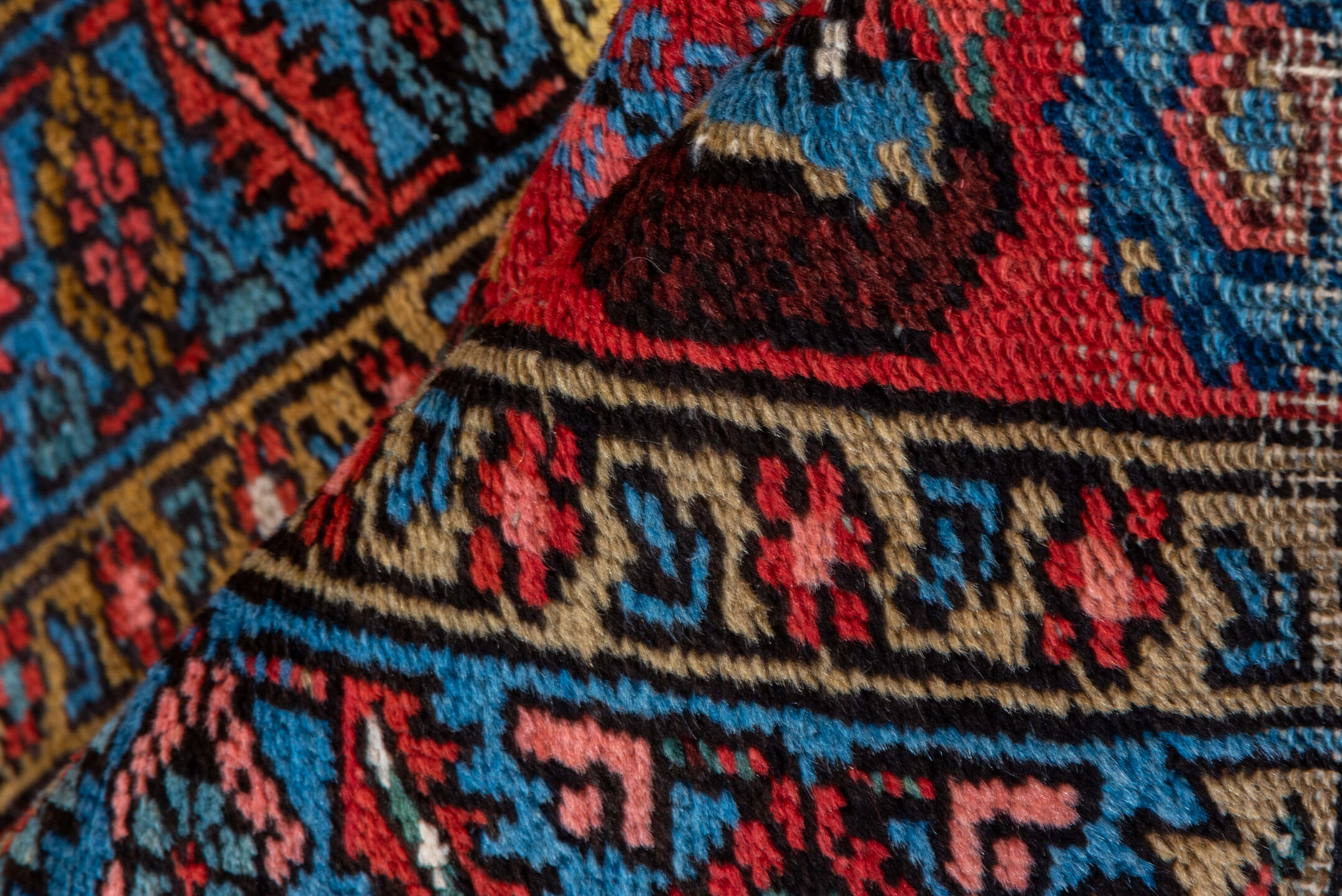 2' x 13' one-of-a-kind handmade vintage Heriz runner rug. Color palette: black, blue, brown, fiord, gray, indian red, pink