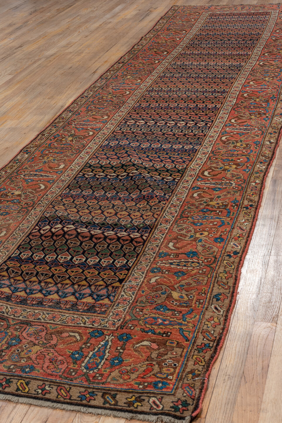 3' x 14' one-of-a-kind handmade vintage Bidjar runner rug. Color palette: blue, brown, gray, pink, red, redwood