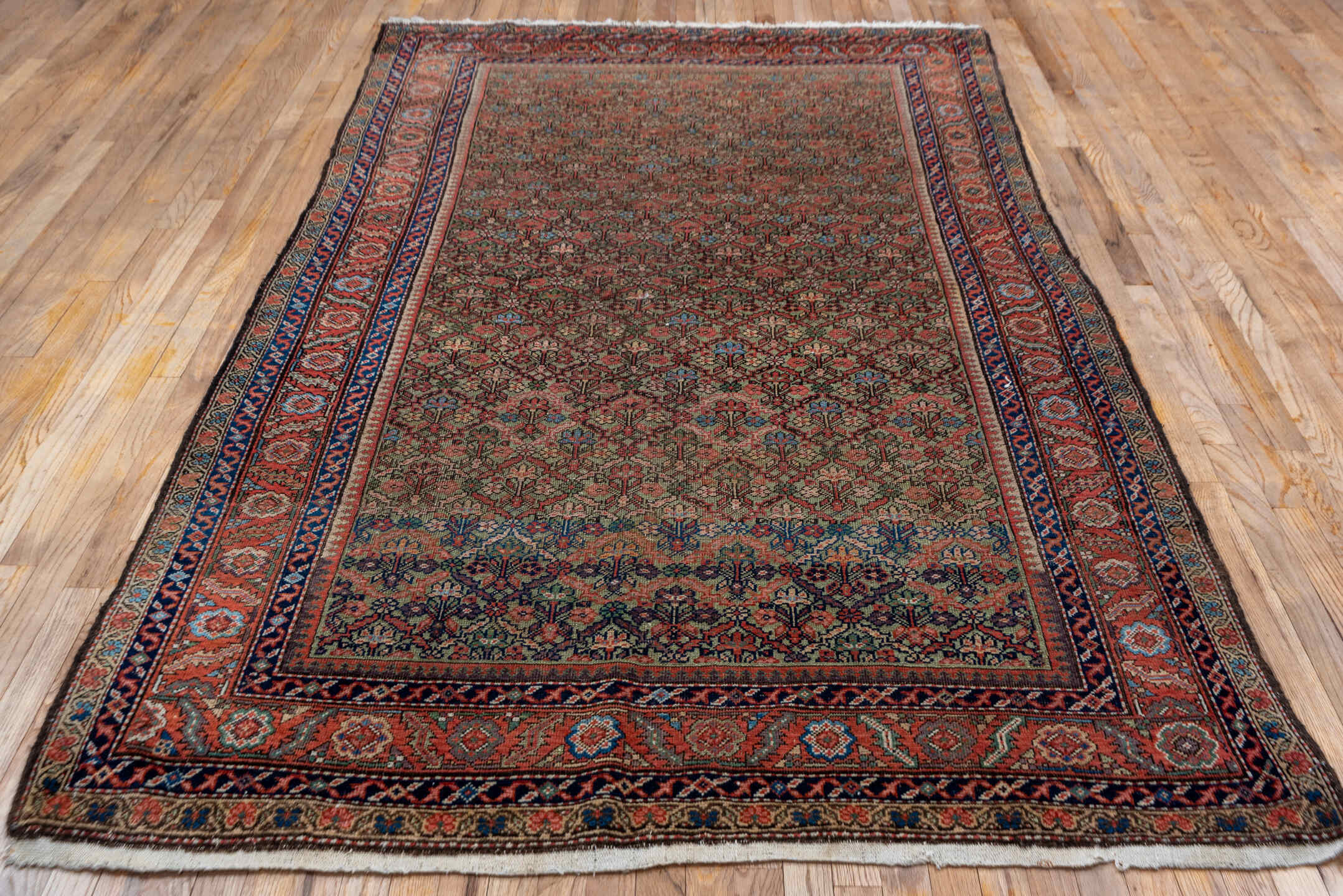 5' x 10' one-of-a-kind handmade vintage Mahal medium size rug. Color palette: brown, gray, pink, red