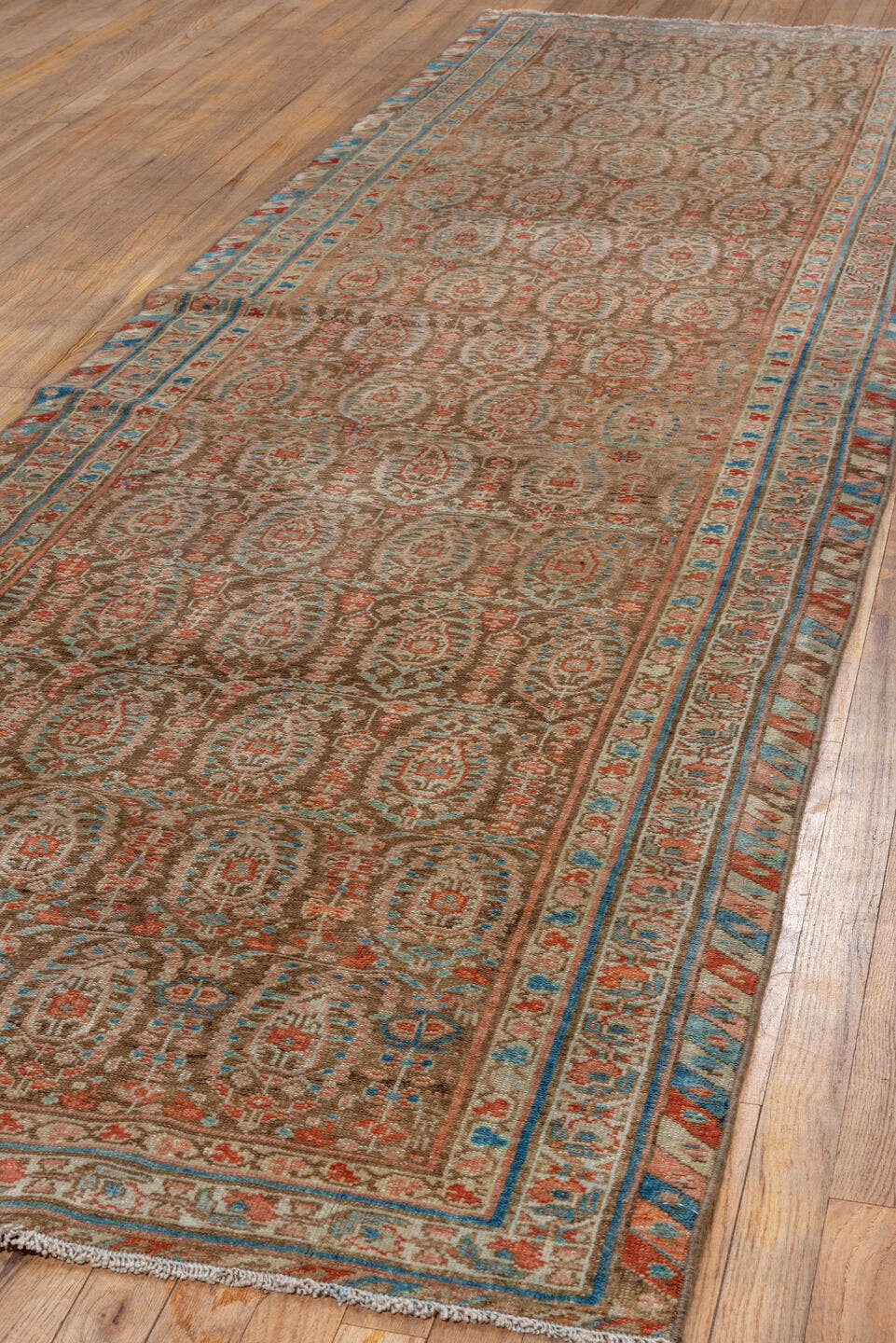 3' x 11' one-of-a-kind handmade vintage Malayer runner rug. Color palette: camel, ivory, sky blue, rust, terra cotta, brown